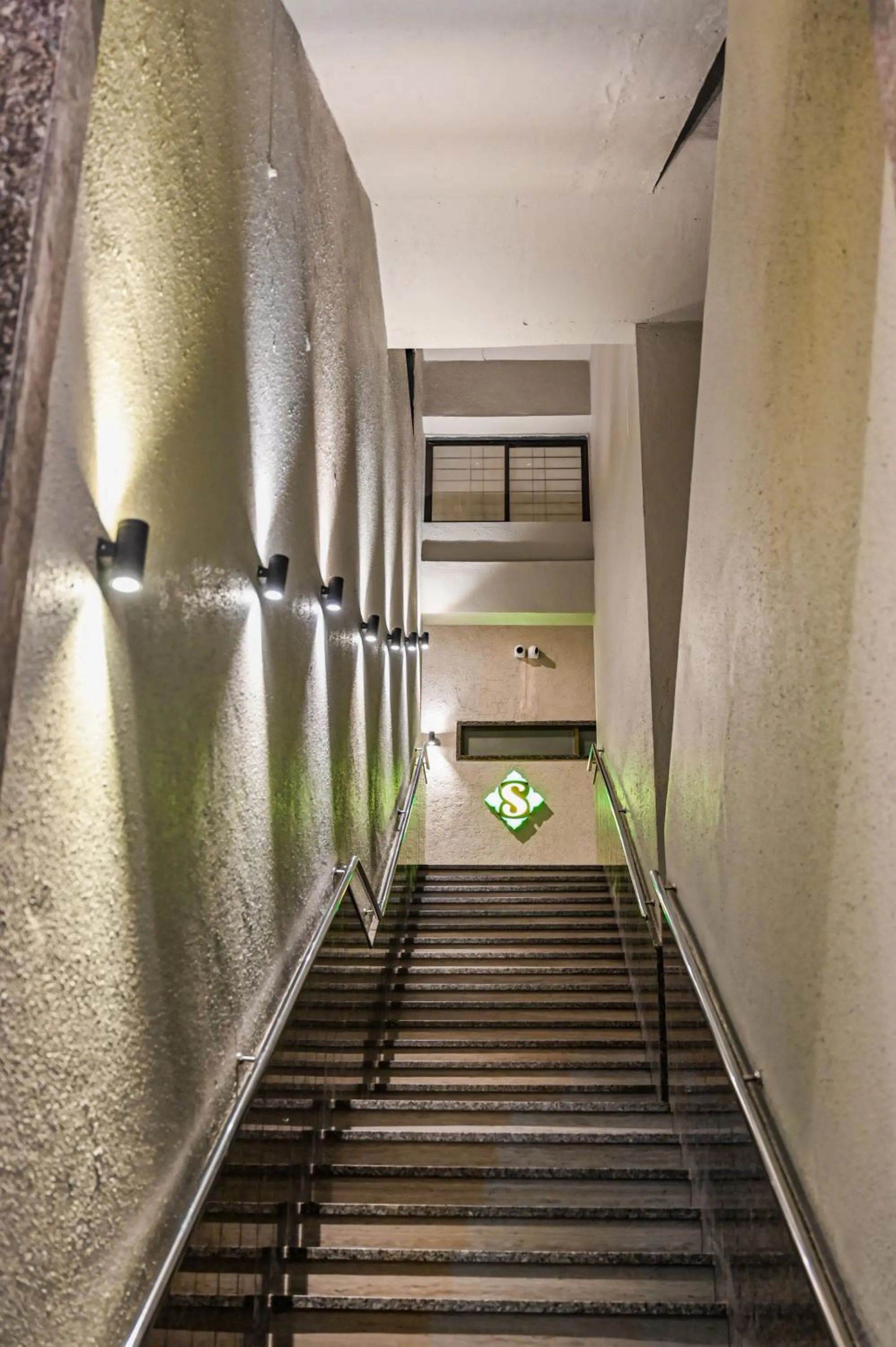 Facade/entrance, Bed in Suvidha Suites
