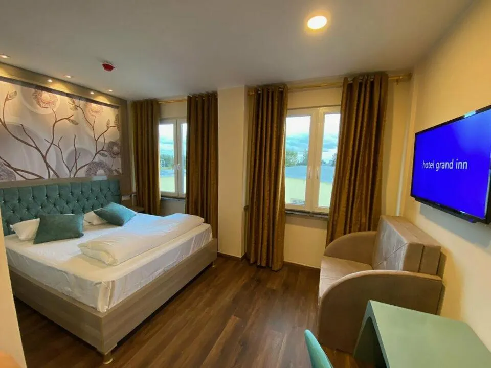 Photo of the whole room, Bed in Hotel Grand Inn