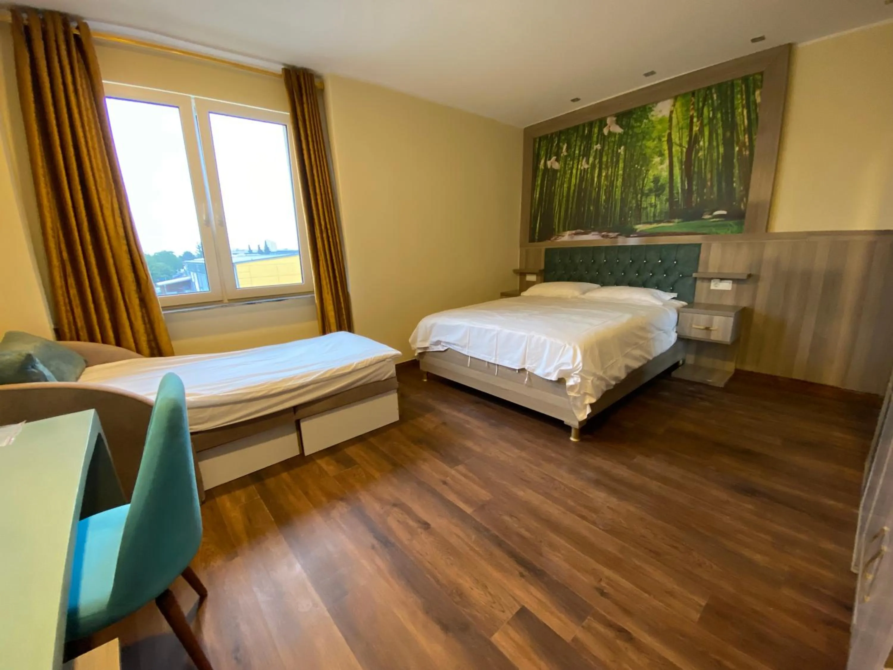 Photo of the whole room, Bed in Hotel Grand Inn