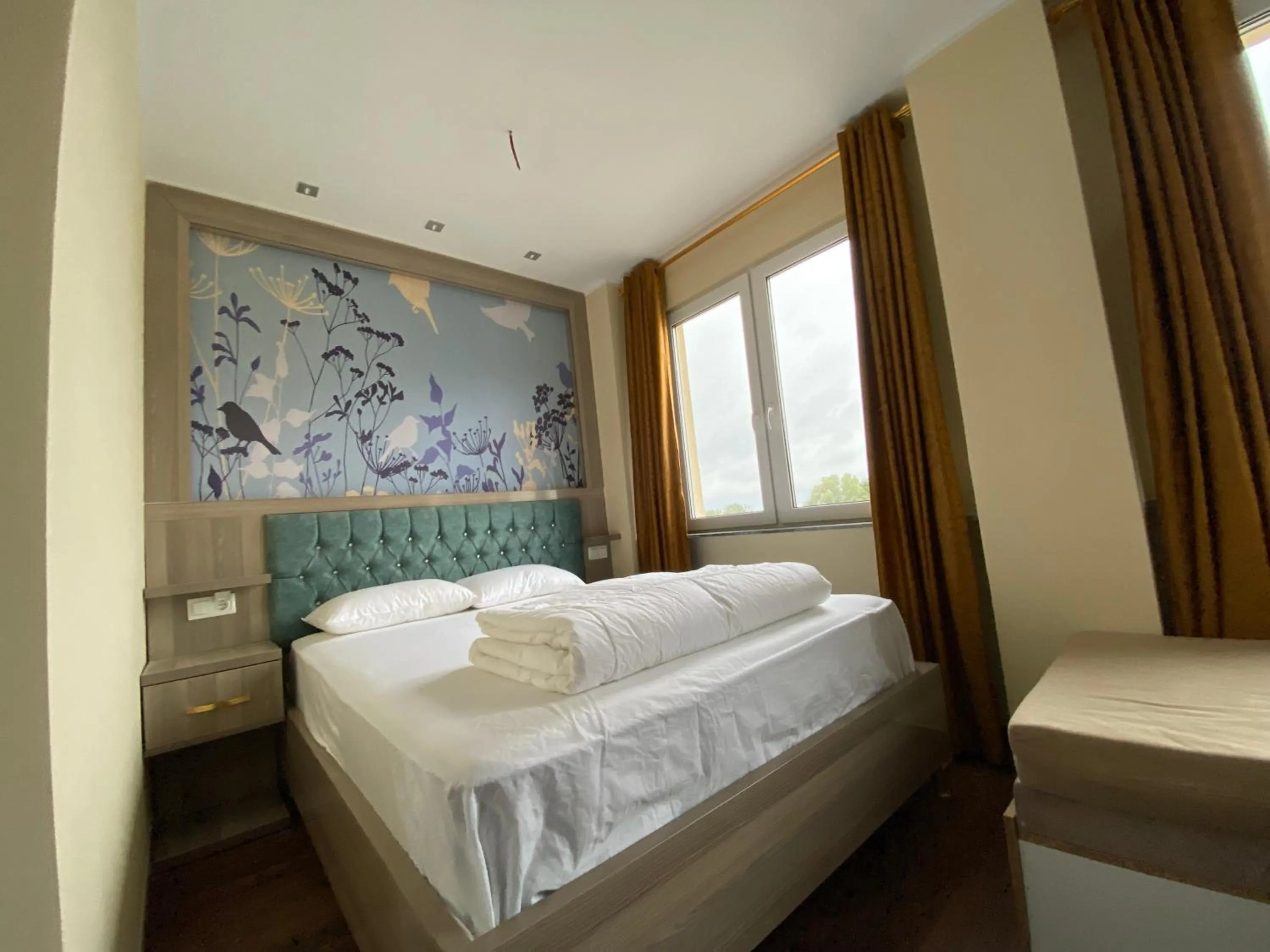 Photo of the whole room, Bed in Hotel Grand Inn