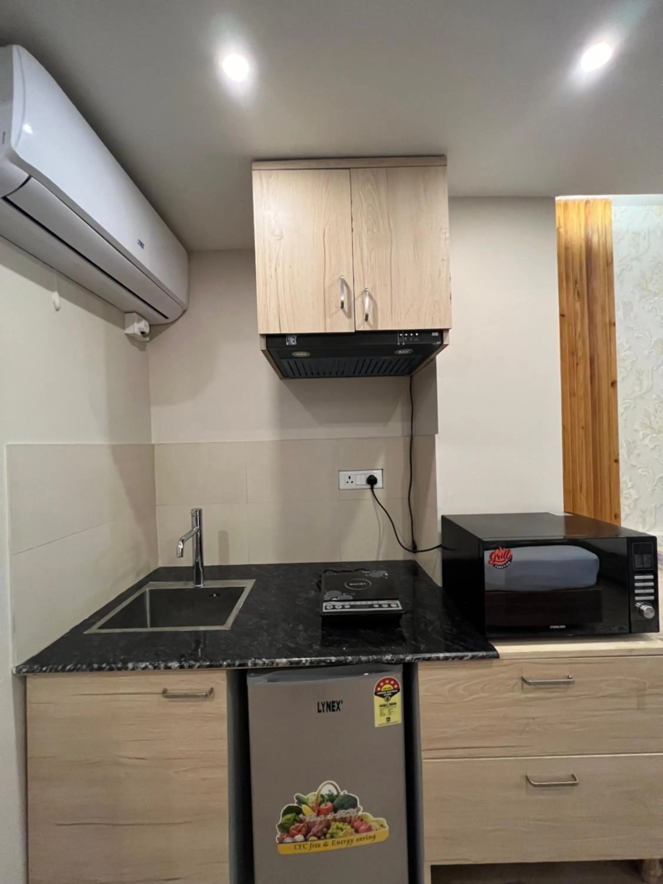 Kitchen or kitchenette in Hotel Kesu Home