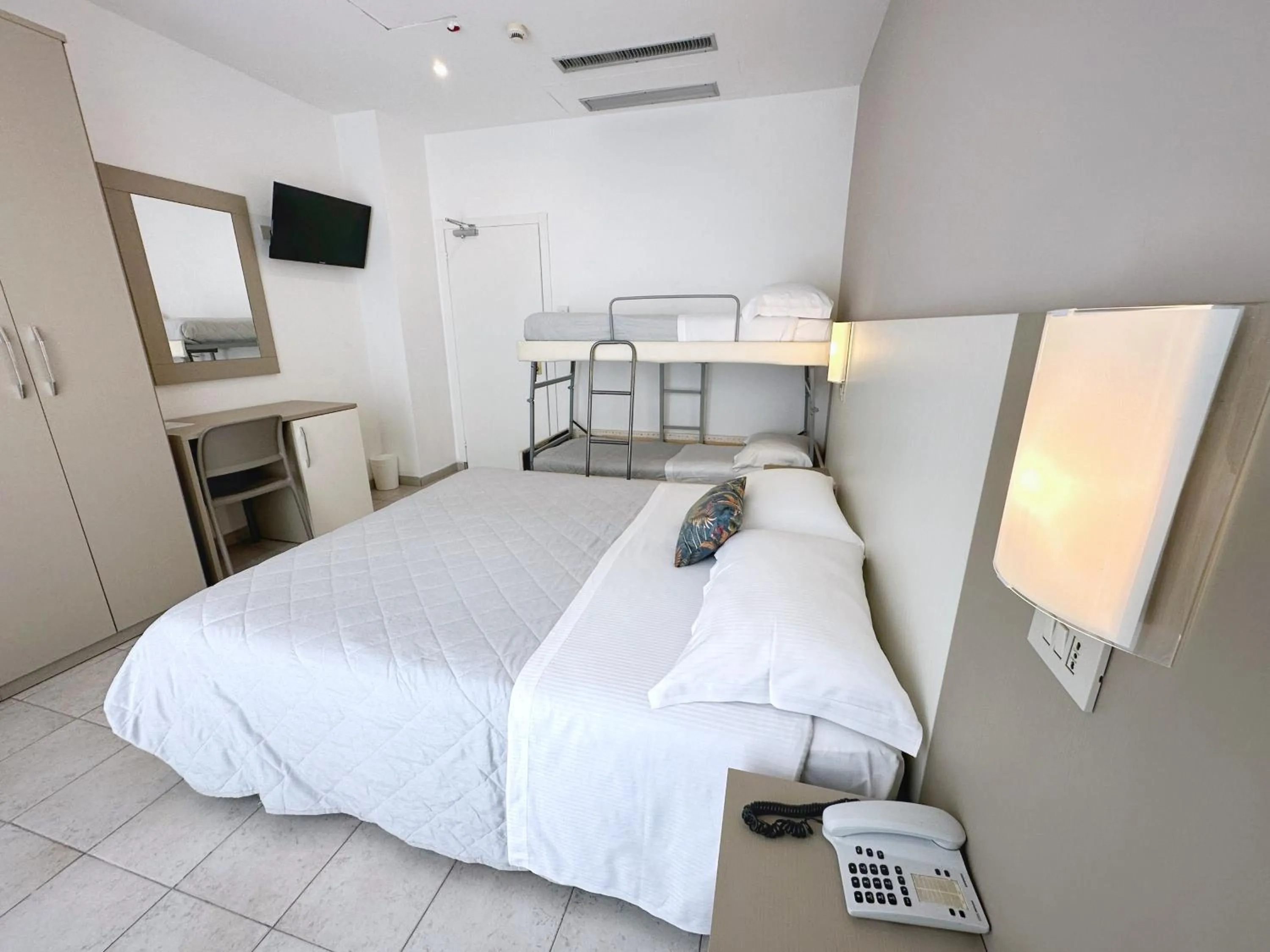 Bed in Aura Living Hotel