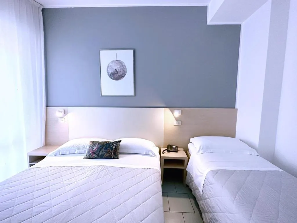 Photo of the whole room, Bed in Aura Living Hotel