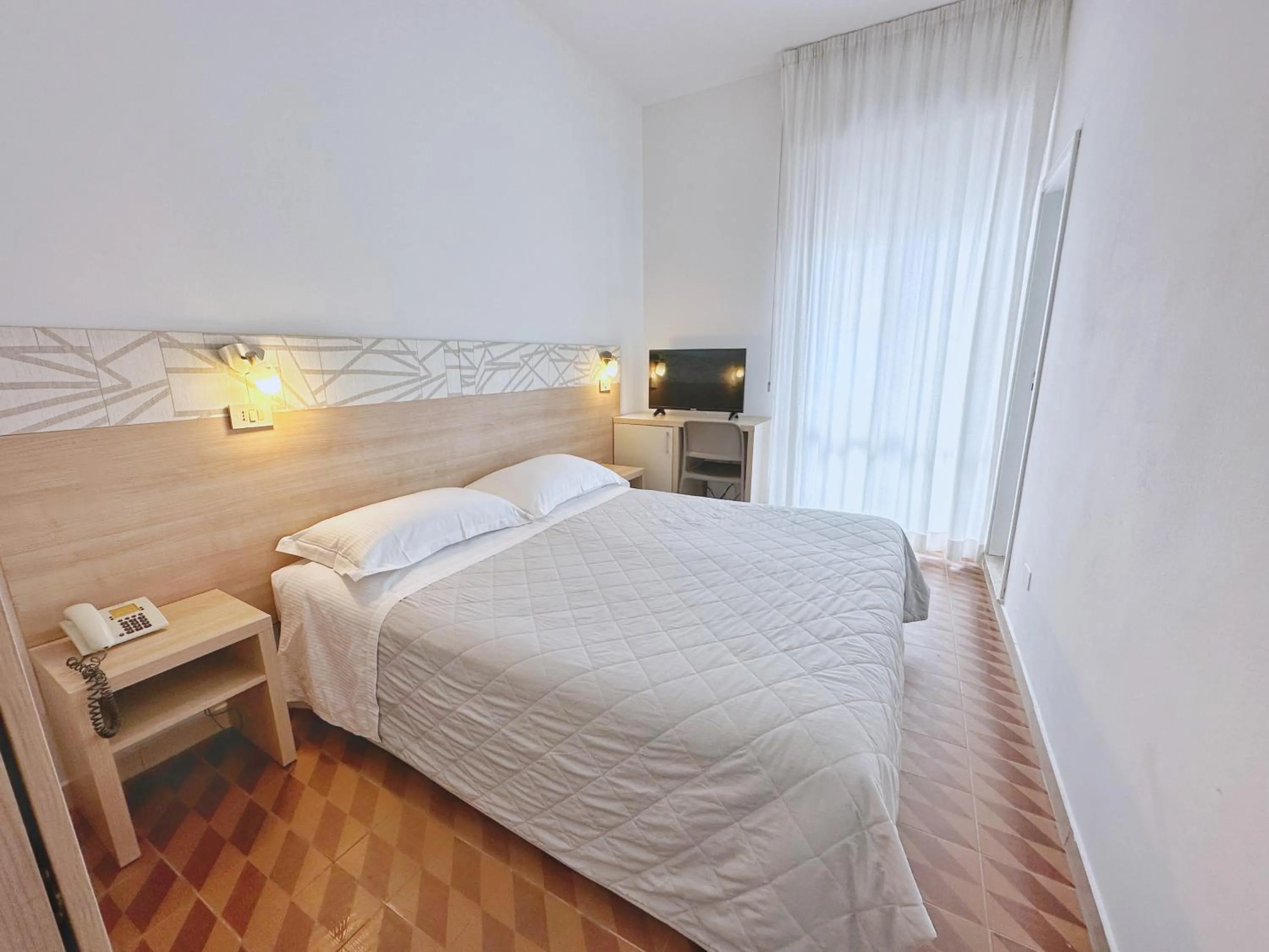 Photo of the whole room, Bed in Aura Living Hotel