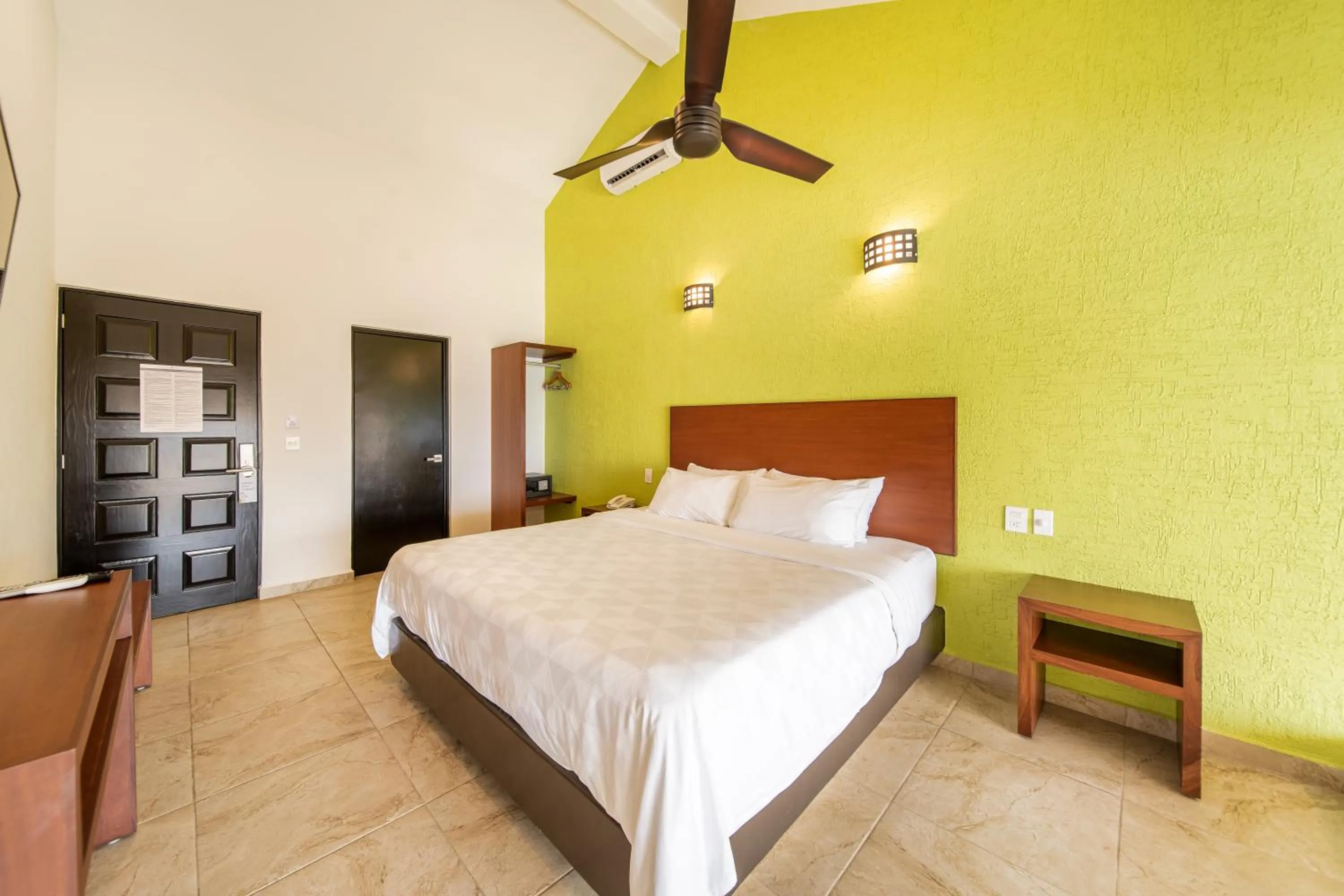 Bed in Villas Coral Huatulco