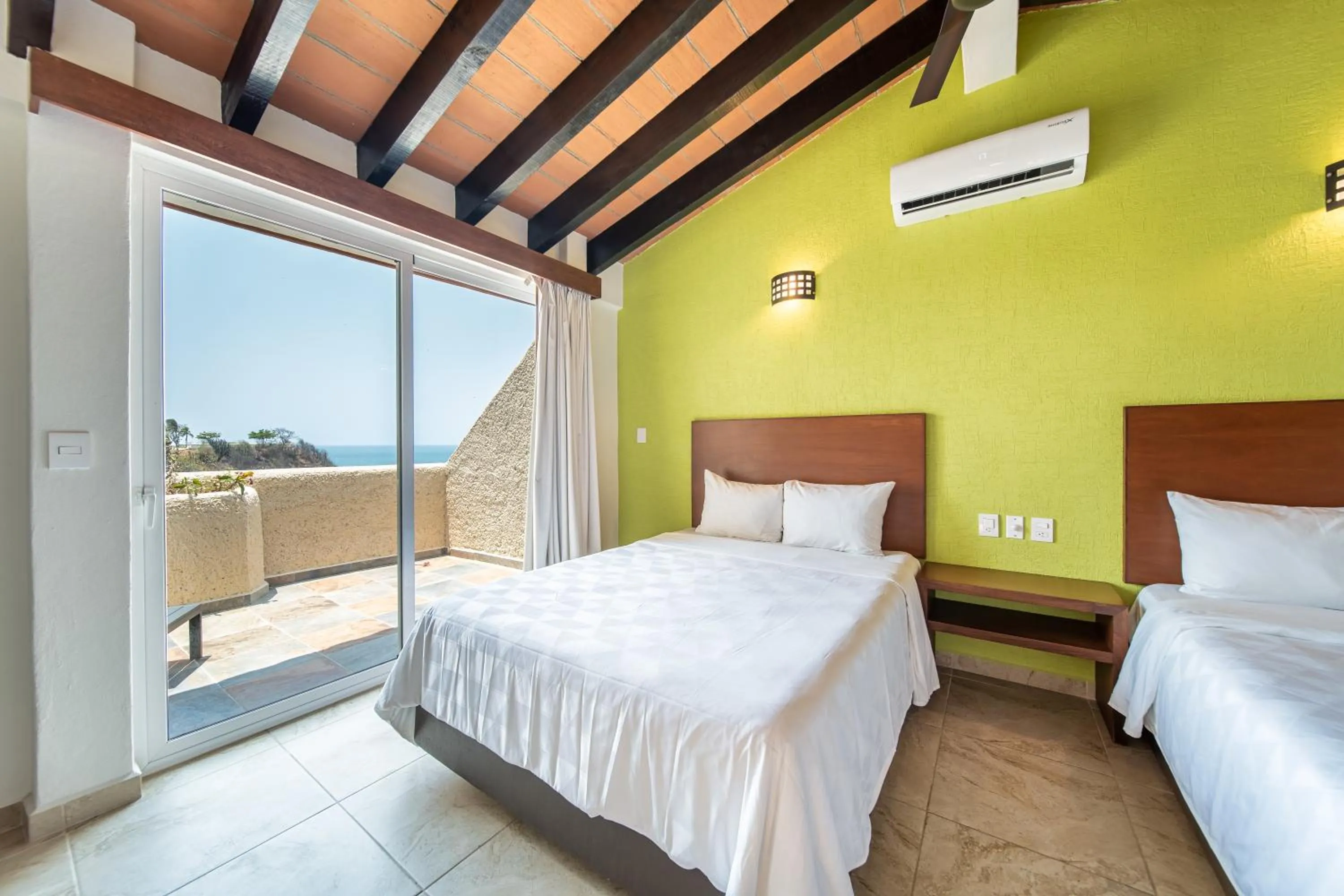 Bedroom, Bed in Villas Coral Huatulco