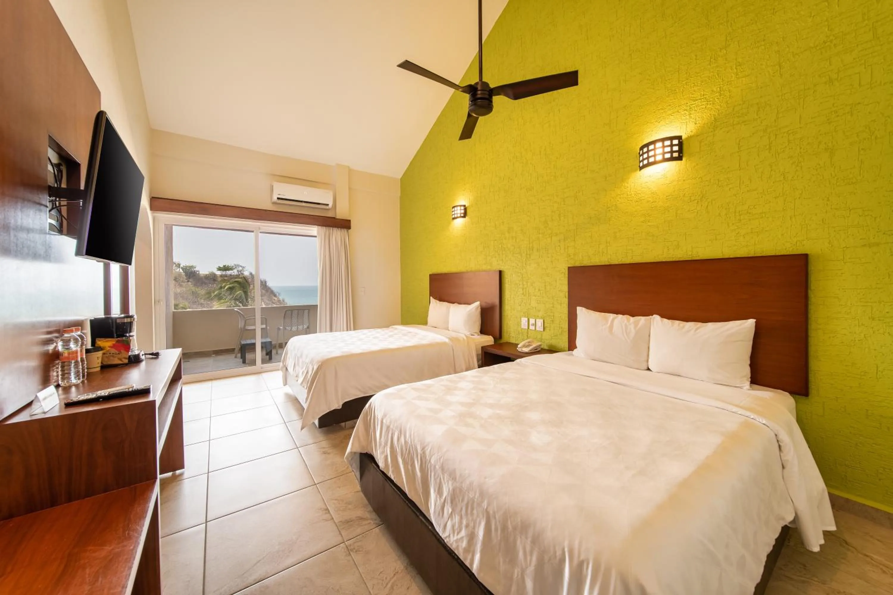 Bed in Villas Coral Huatulco