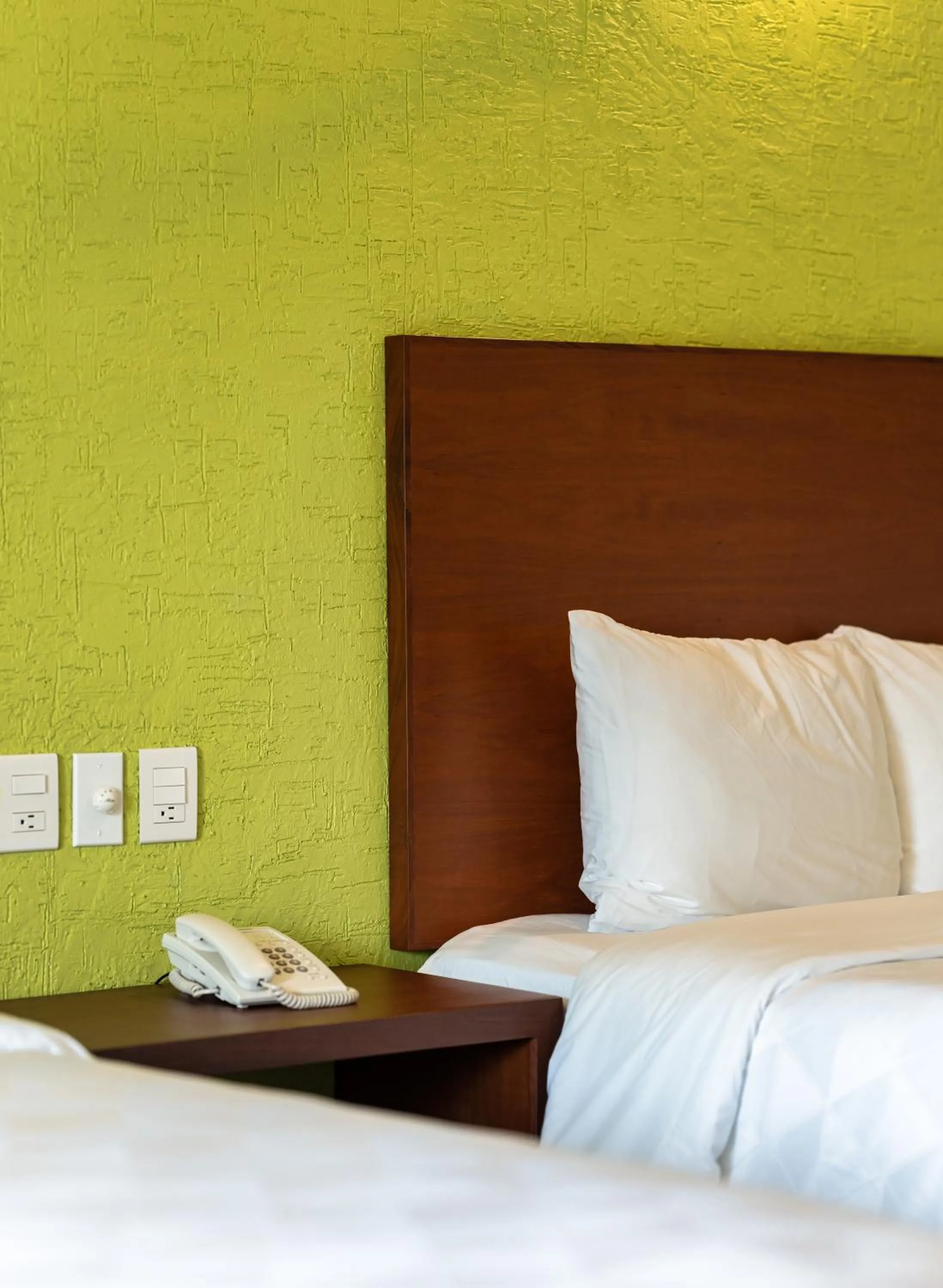 Bed in Villas Coral Huatulco