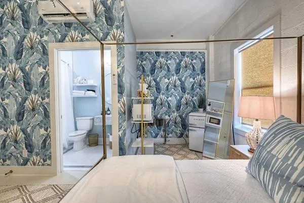 Bed in The Oleander Hotel Room 5