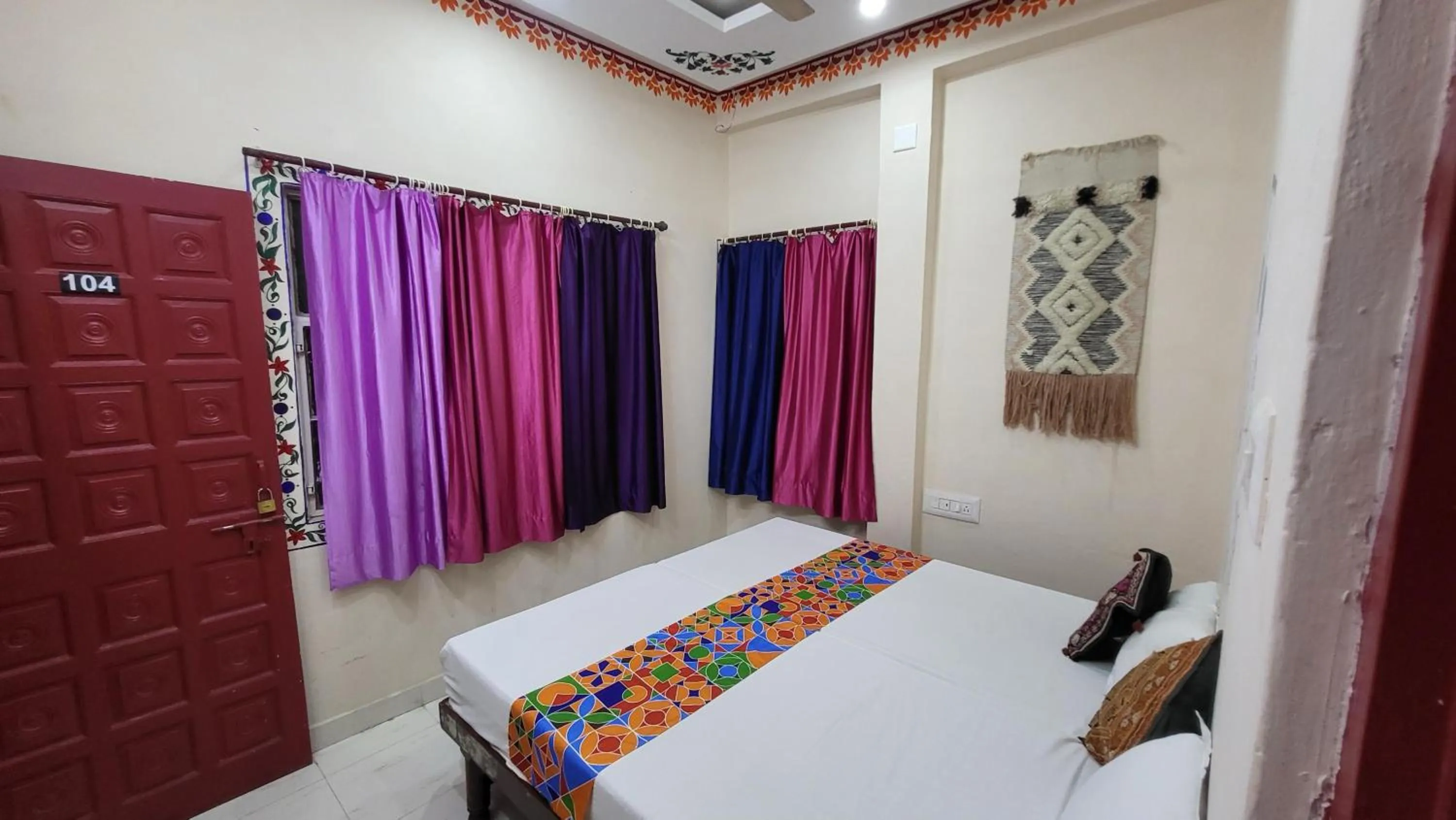 Photo of the whole room, Bed in HOTEL HANUMAN GHAT On LAKE PICHOLA