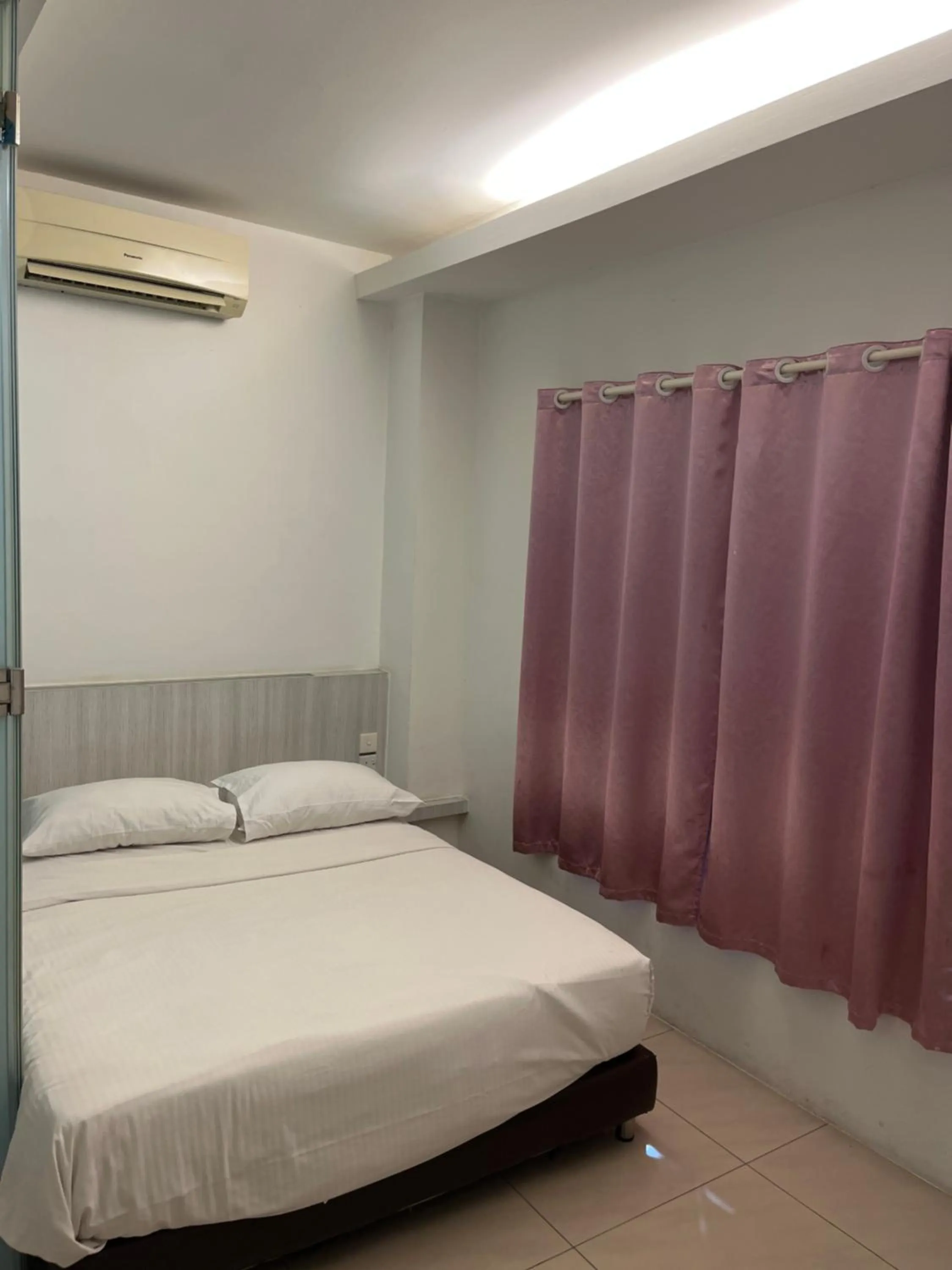 Bed in Coastline Hotel