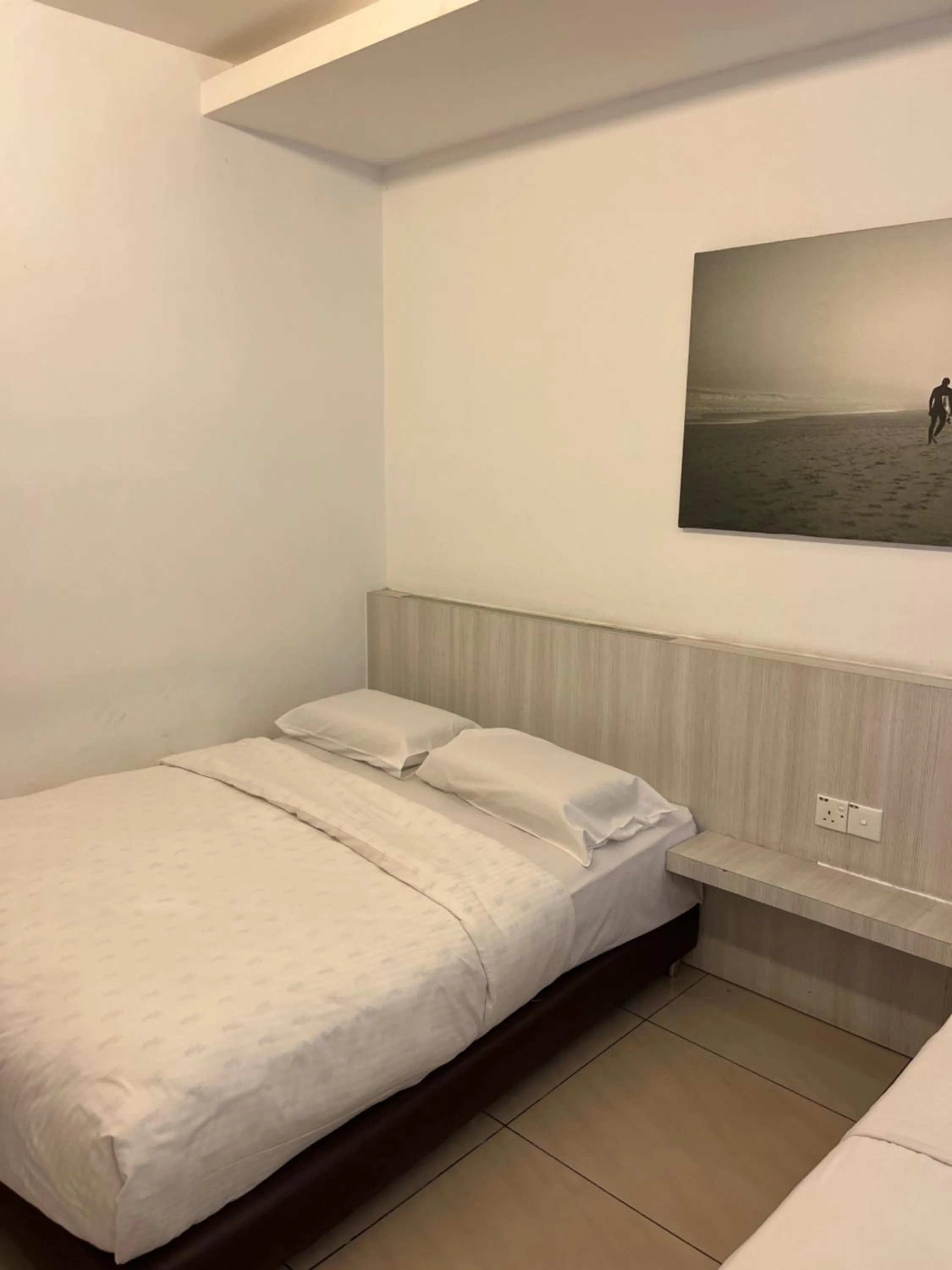 Bed in Coastline Hotel