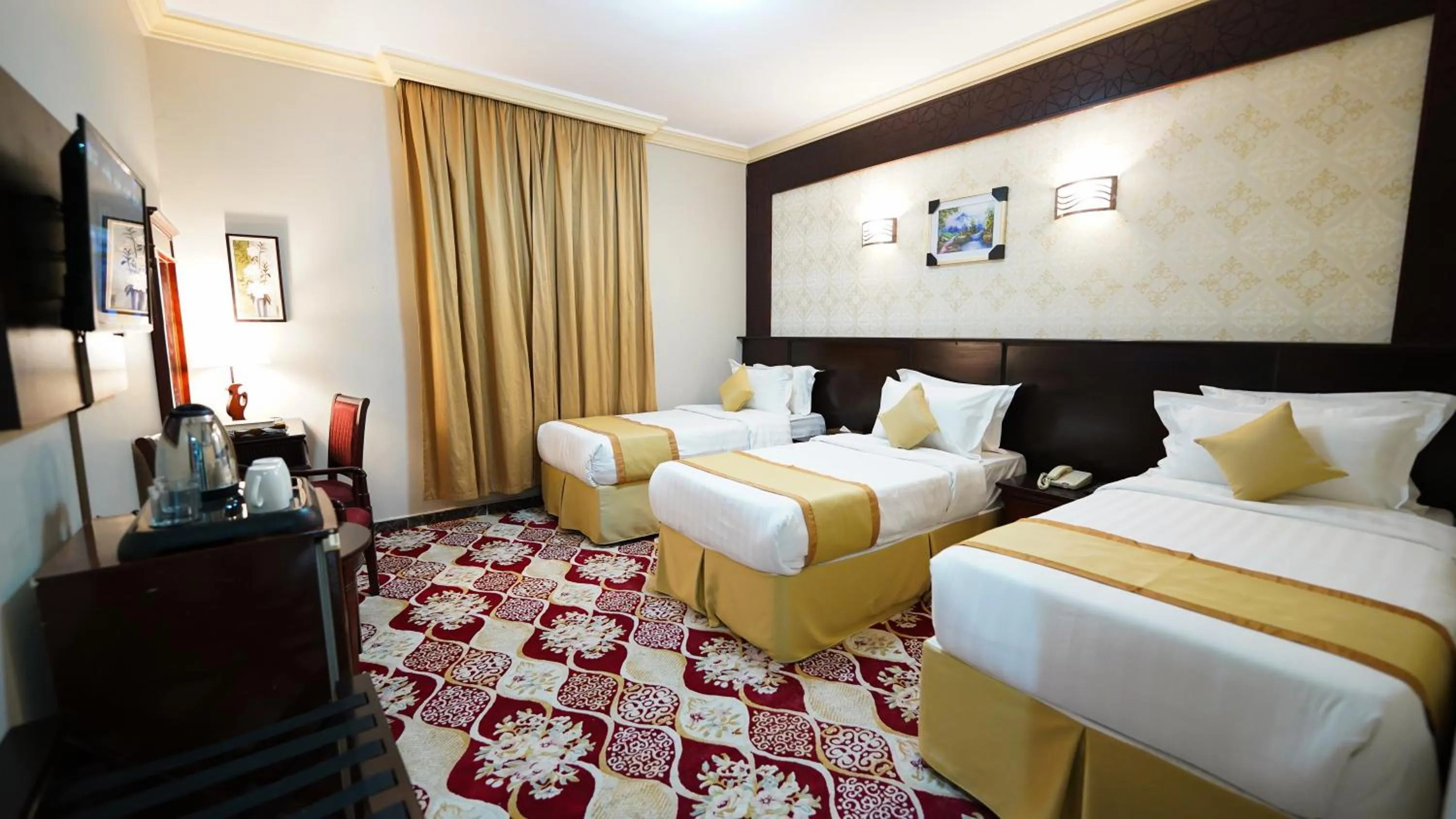 Photo of the whole room, Bed in Al Kiram Hotel Al Azizia