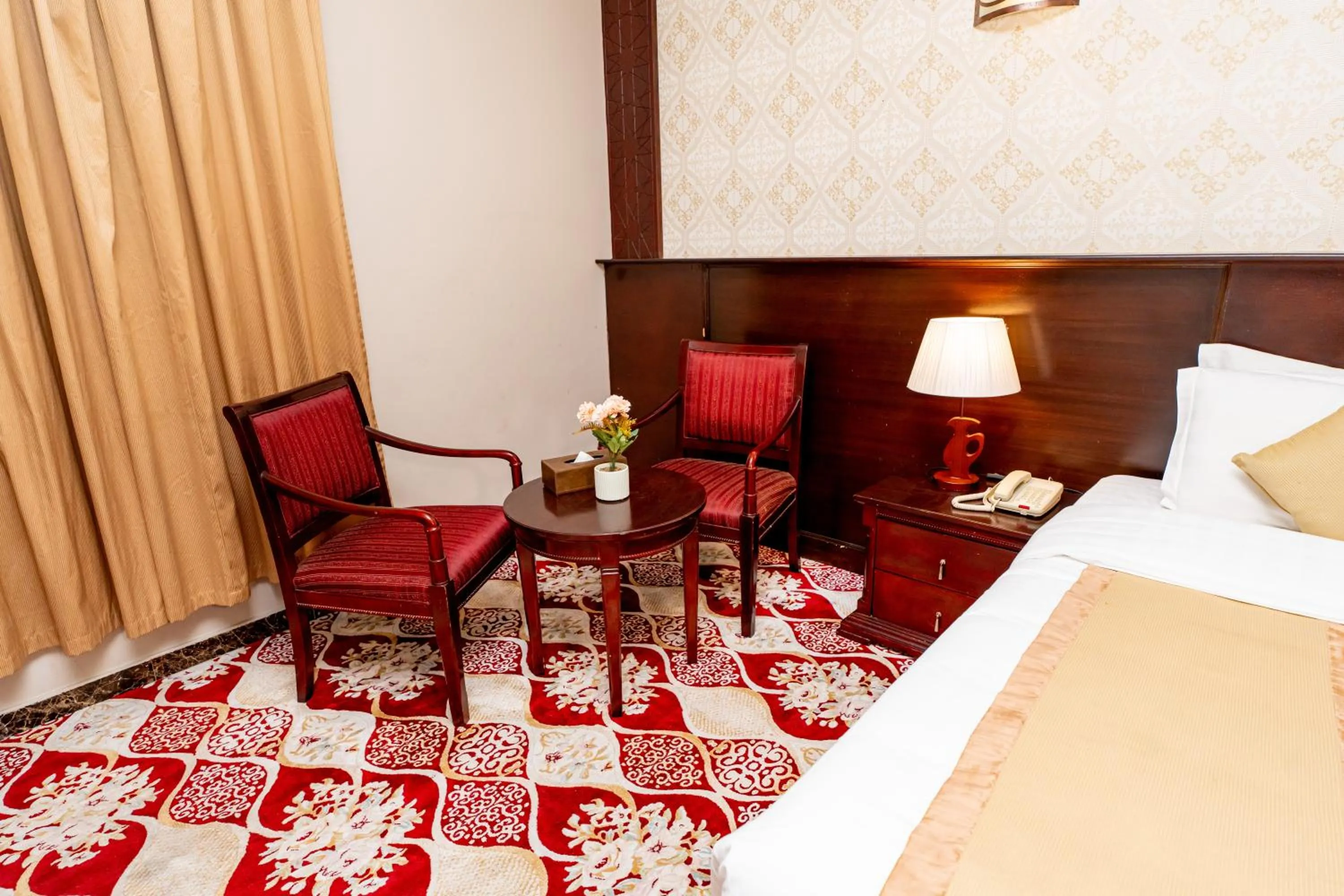 Seating area, Bed in Al Kiram Hotel Al Azizia