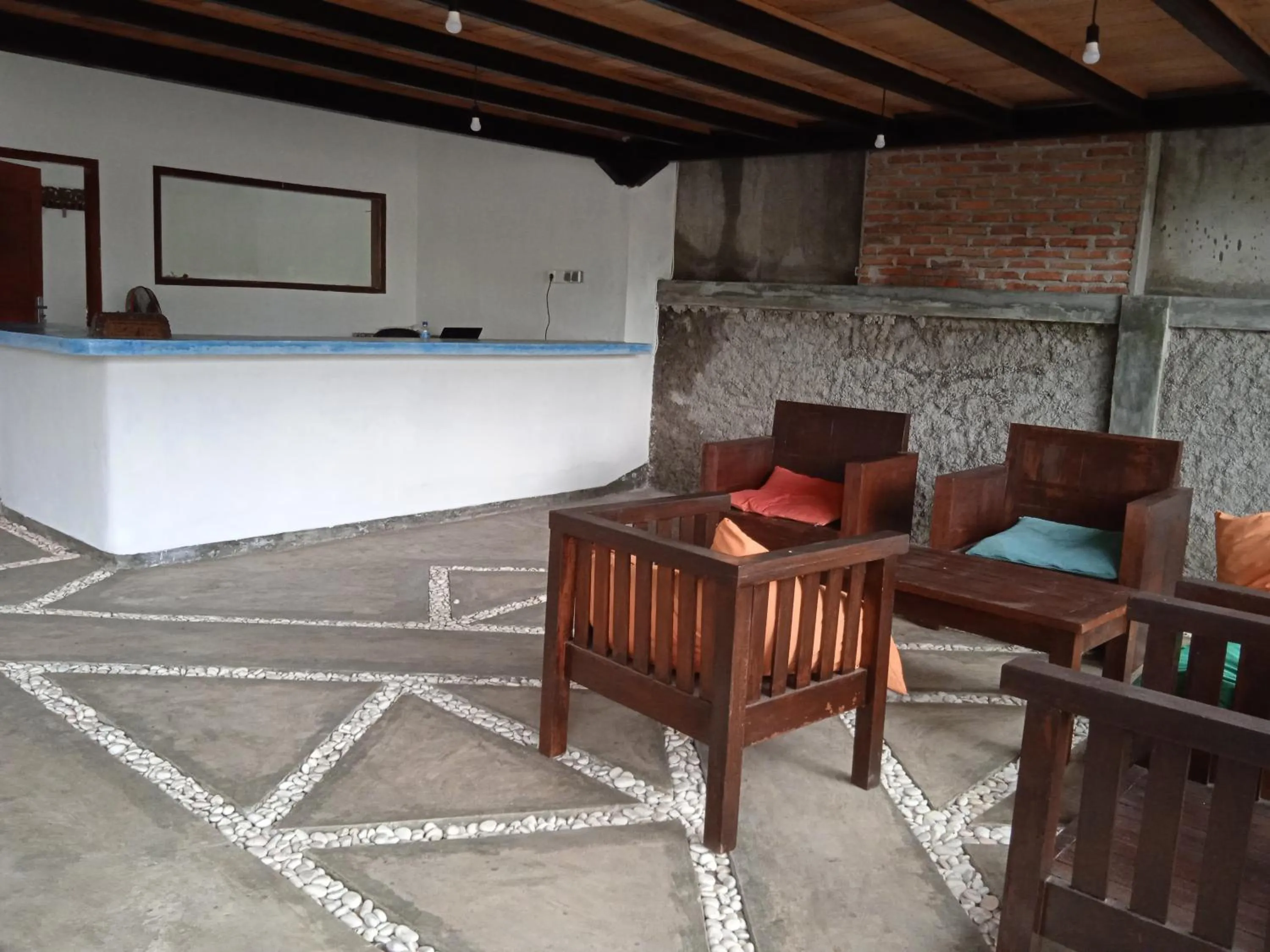 Lobby or reception in family house hotel kuta