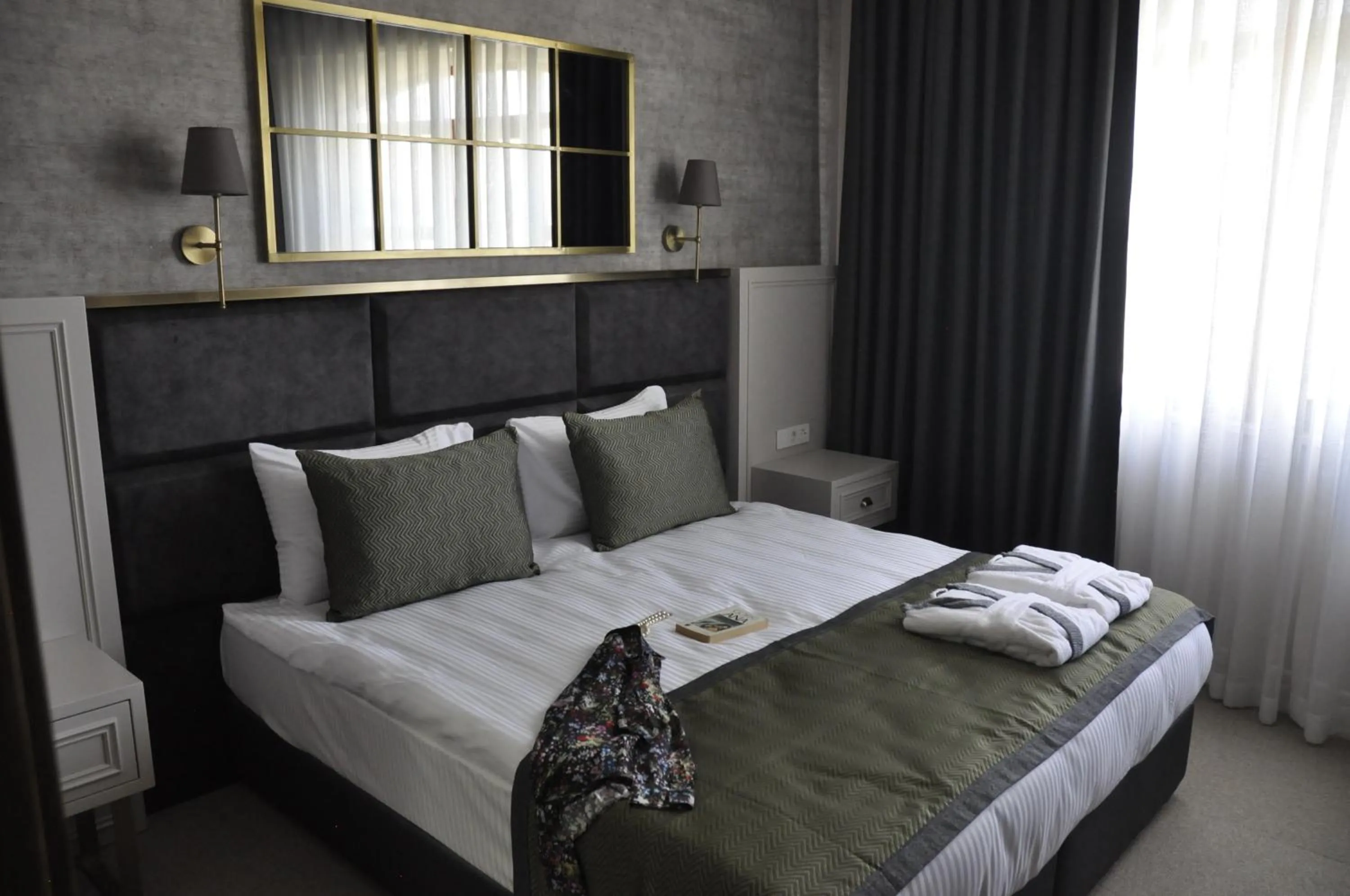 Bed in CONNECT THERMAL HOTEL