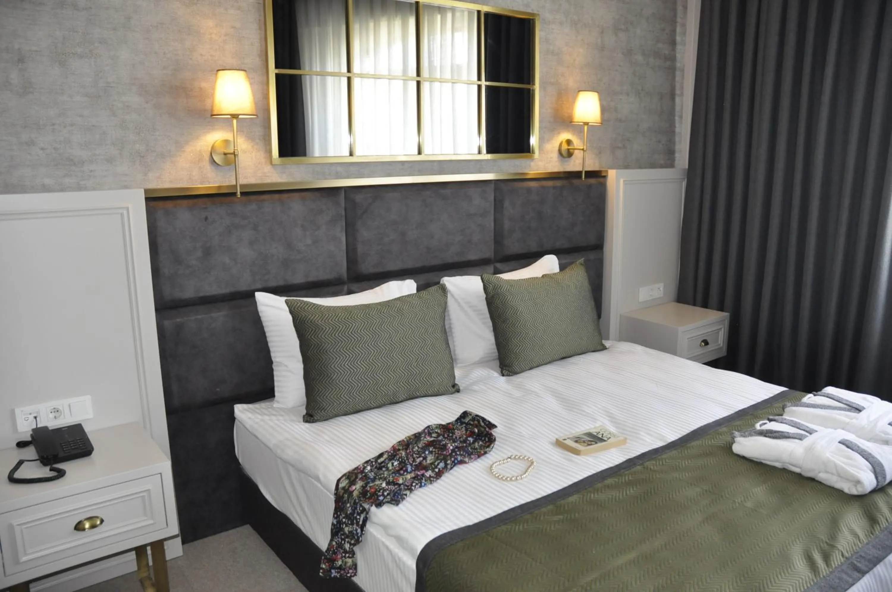 Bed in CONNECT THERMAL HOTEL