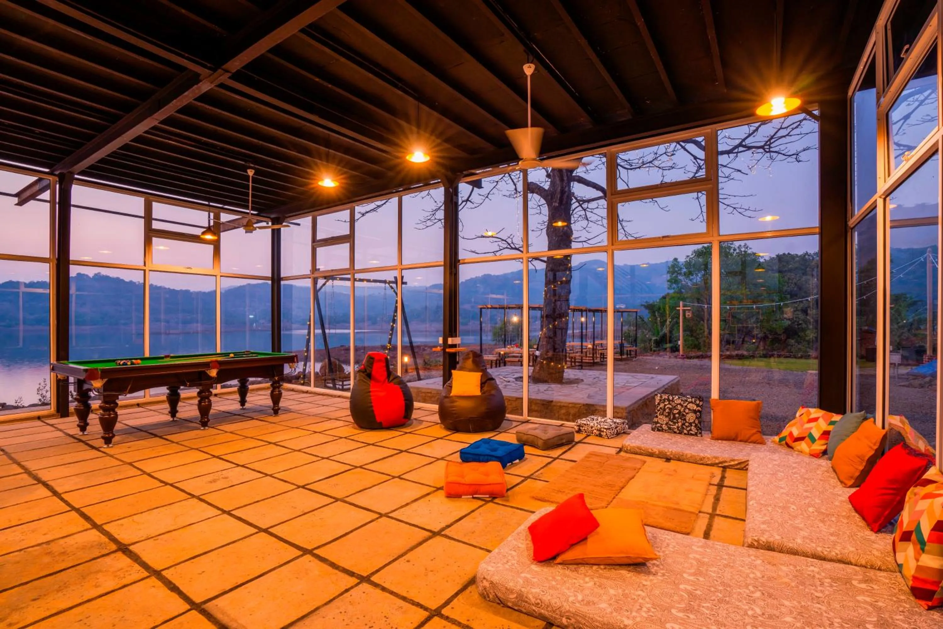 Communal lounge/ TV room in Zostel Plus Lonavala