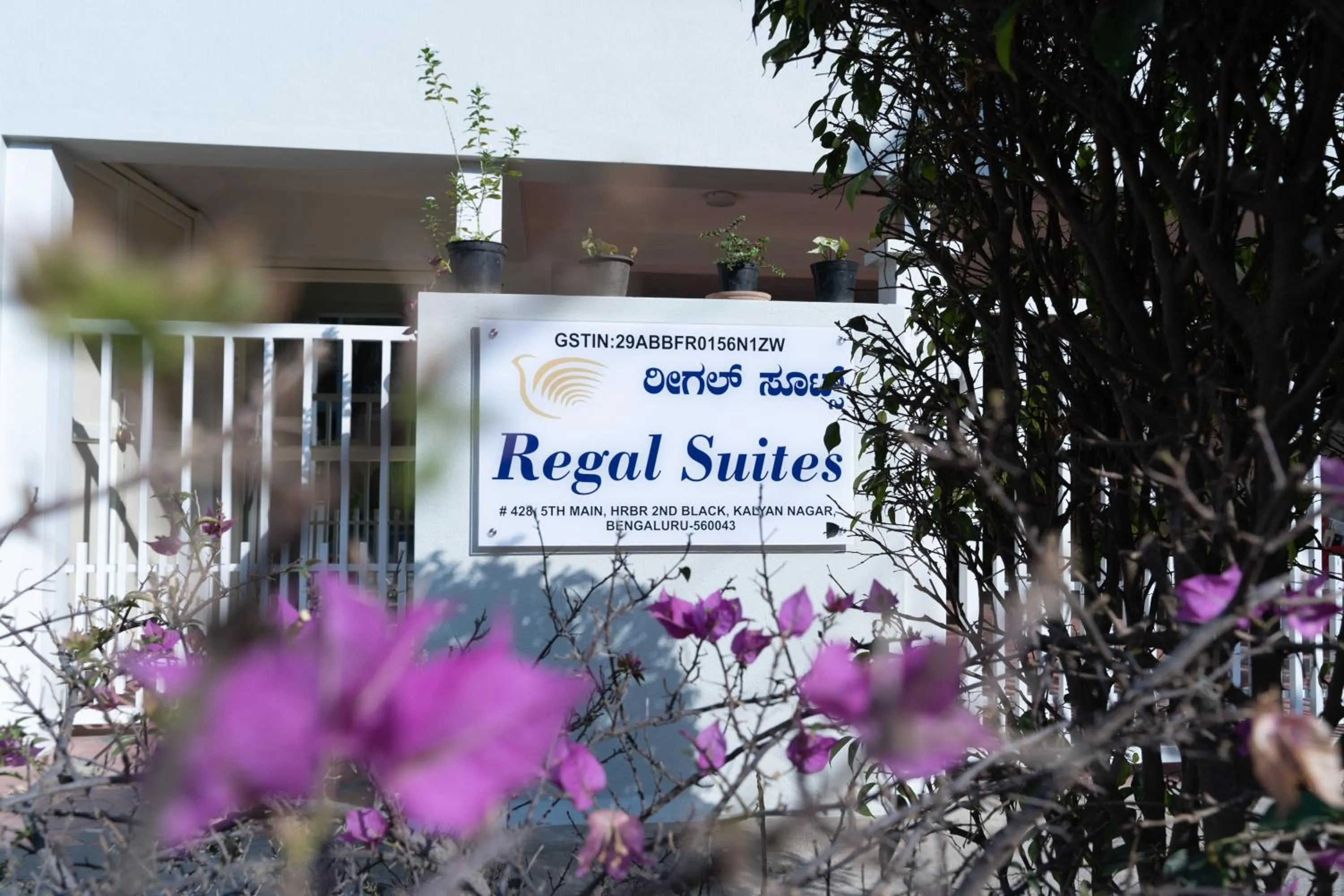 Property logo or sign in Regal Suites