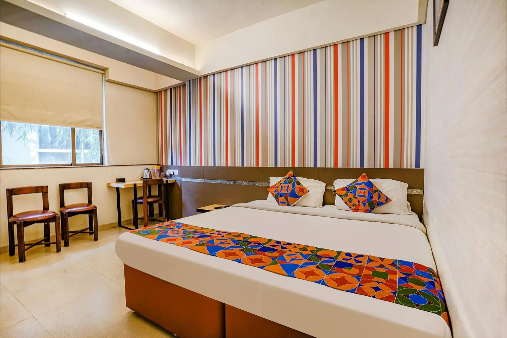 Bed in FabHotel Gargi Deluxe