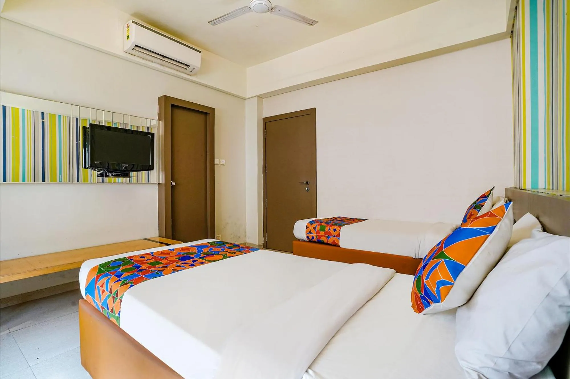 Bed in FabHotel Gargi Deluxe