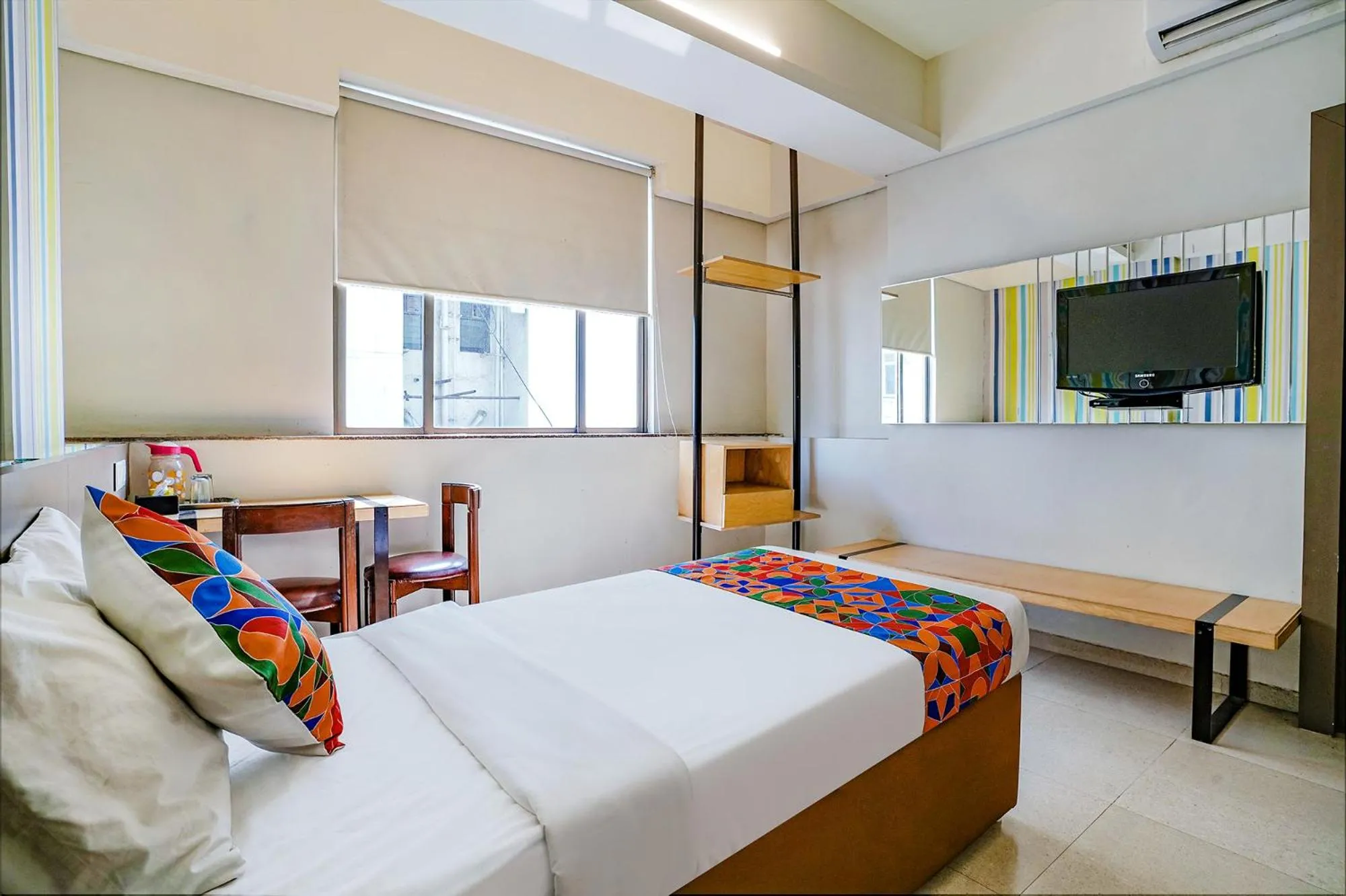 Bed in FabHotel Gargi Deluxe