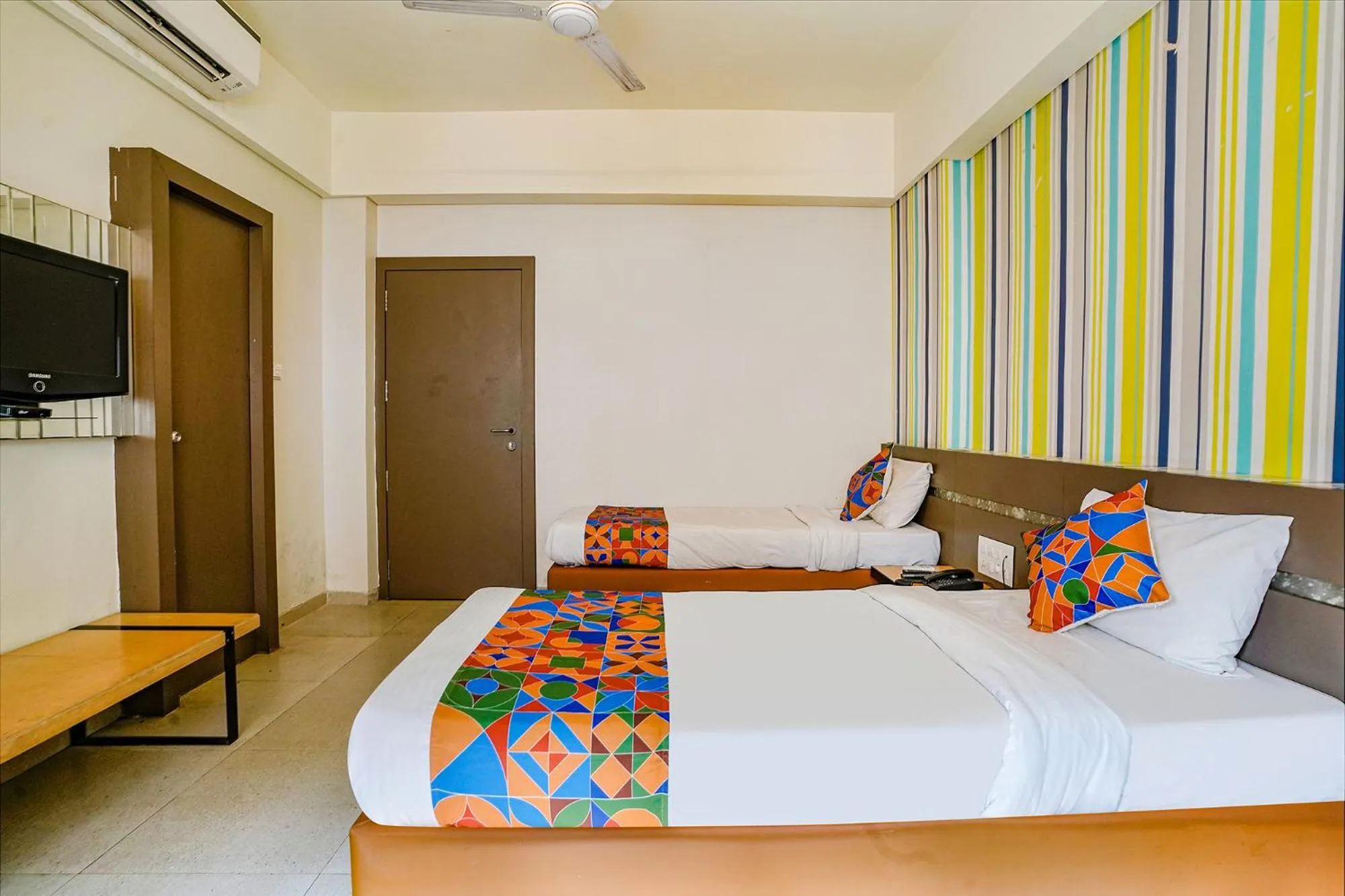 Bed in FabHotel Gargi Deluxe