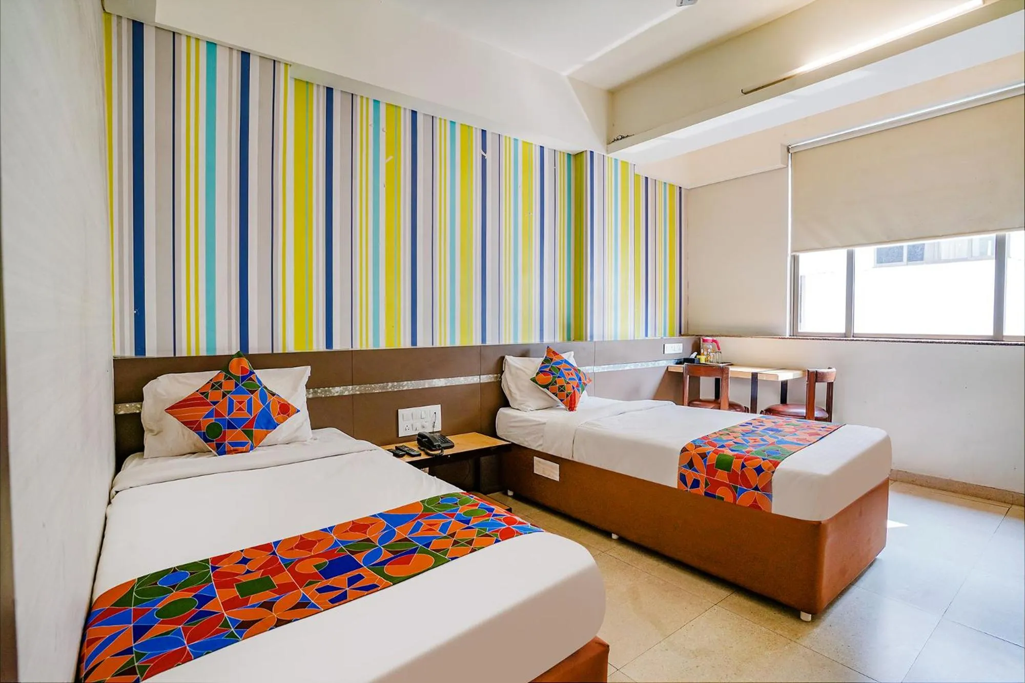 Bed in FabHotel Gargi Deluxe