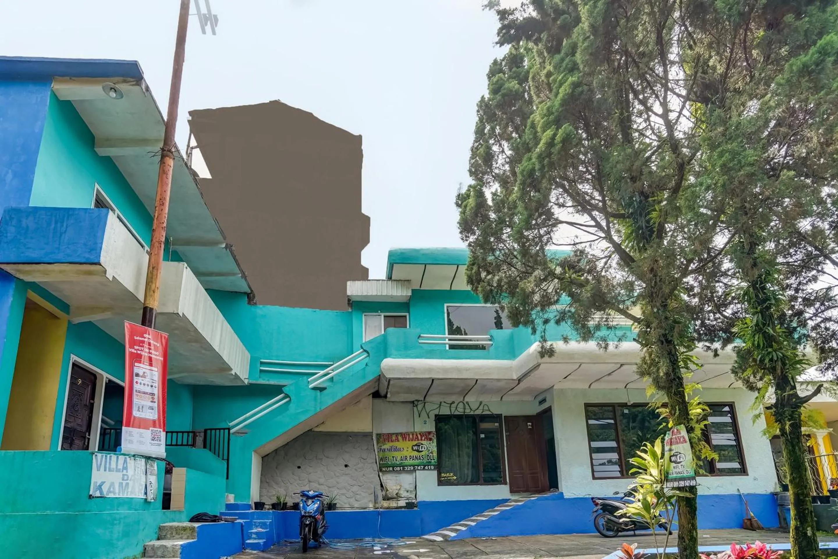 Facade/entrance in OYO Life 91060 Villa Wijaya Homestay