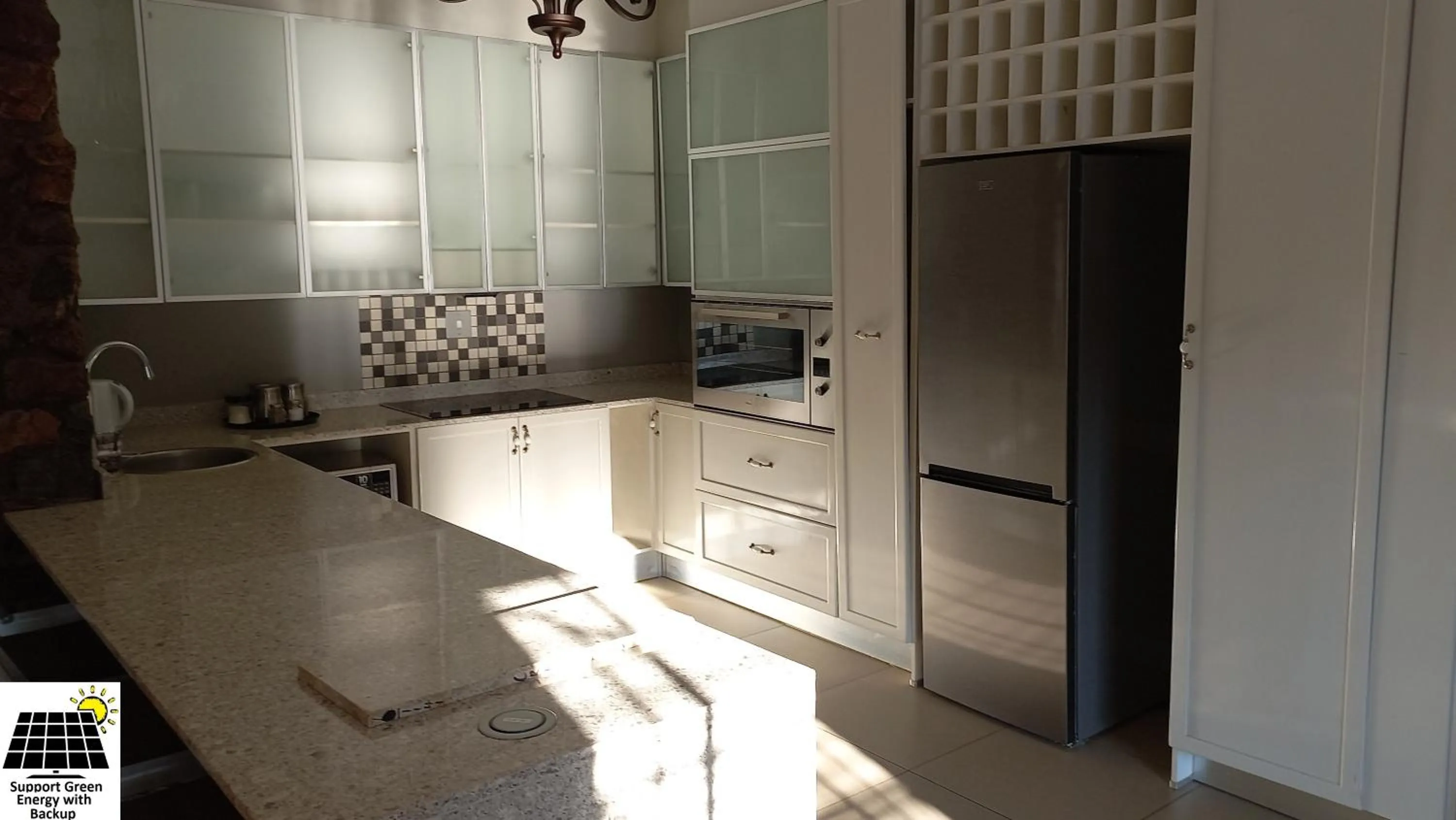 Kitchen or kitchenette in SnL Guesthouse at Visarend