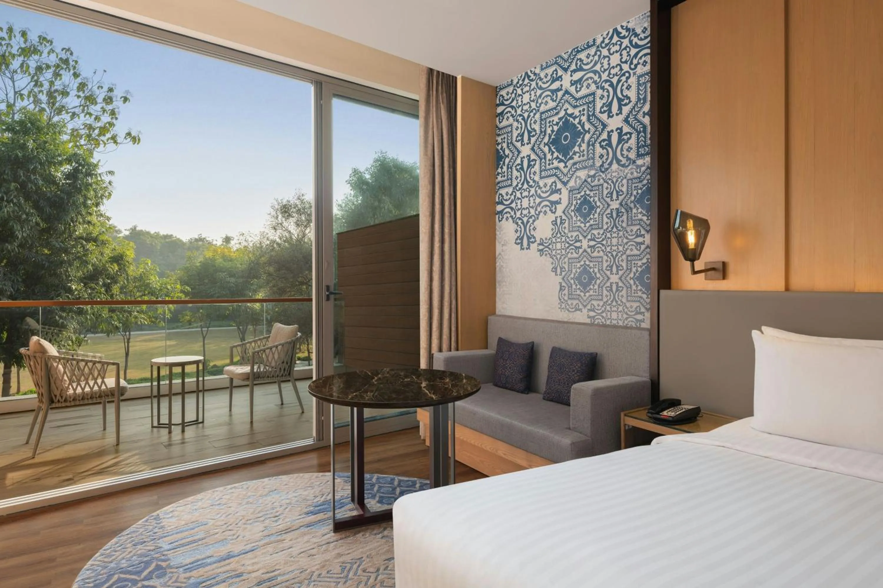 Photo of the whole room, Bed in Courtyard by Marriott Aravali Resort