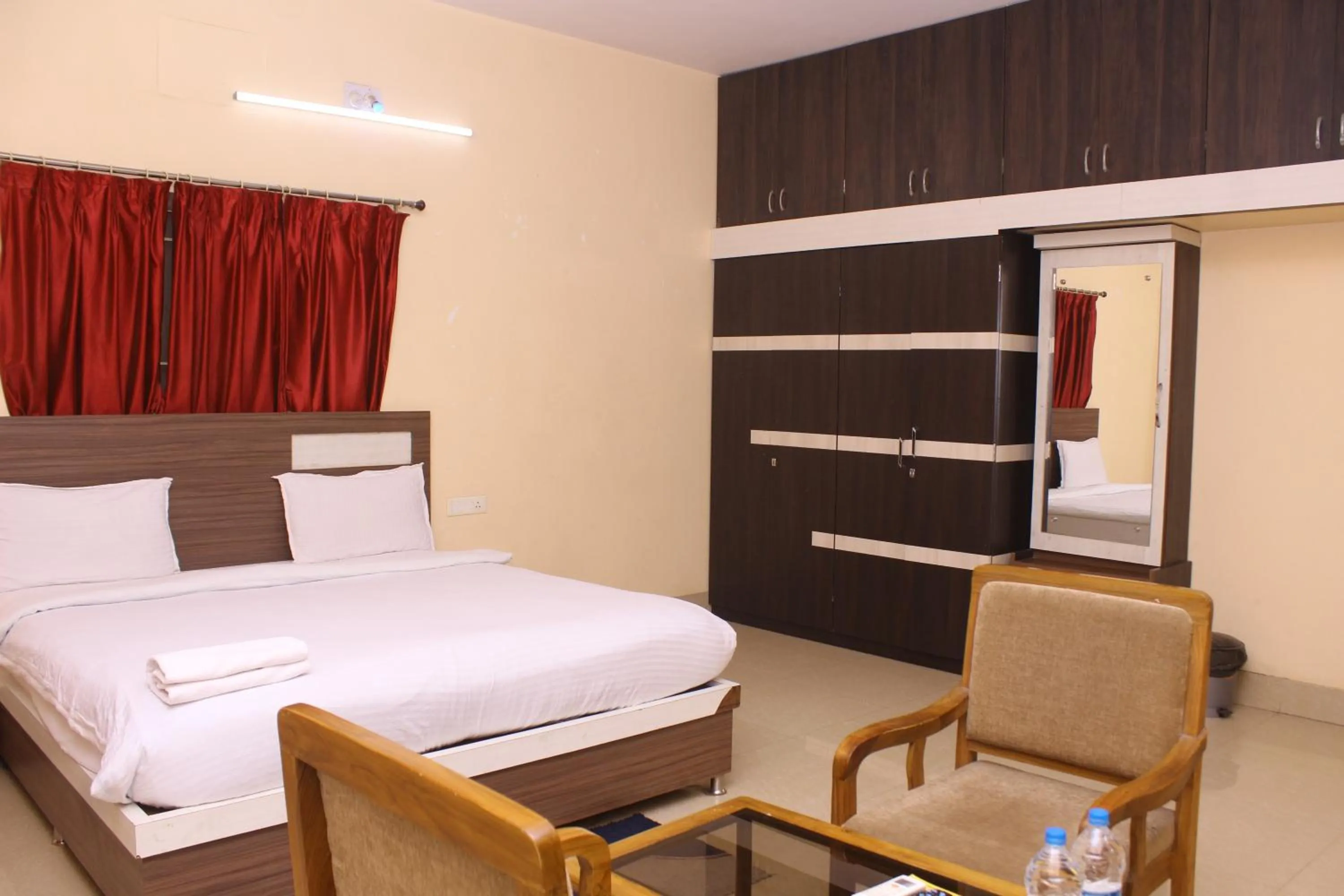 Bed in CHETAN INN HOTEL