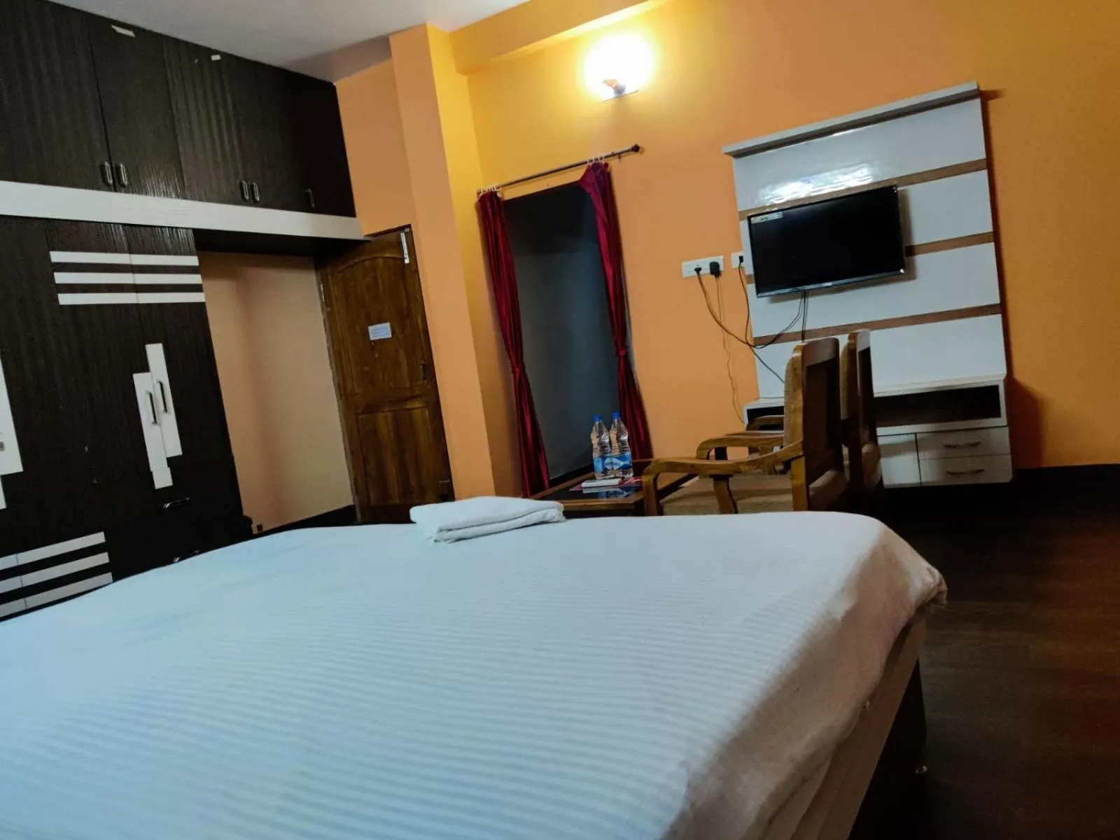 Bed in CHETAN INN HOTEL