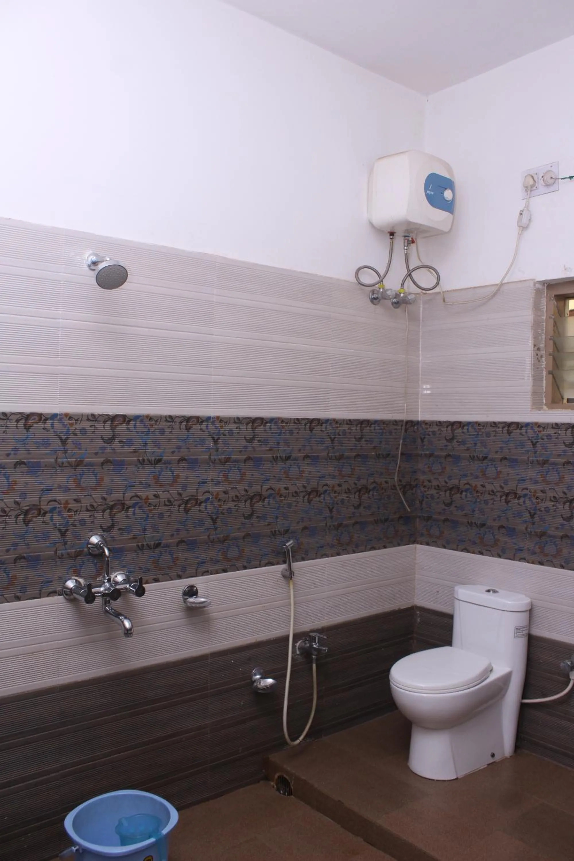 Shower in CHETAN INN HOTEL