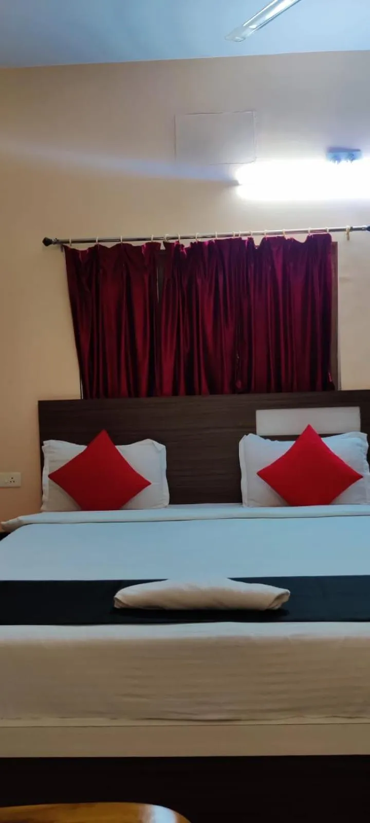 Bed in CHETAN INN HOTEL