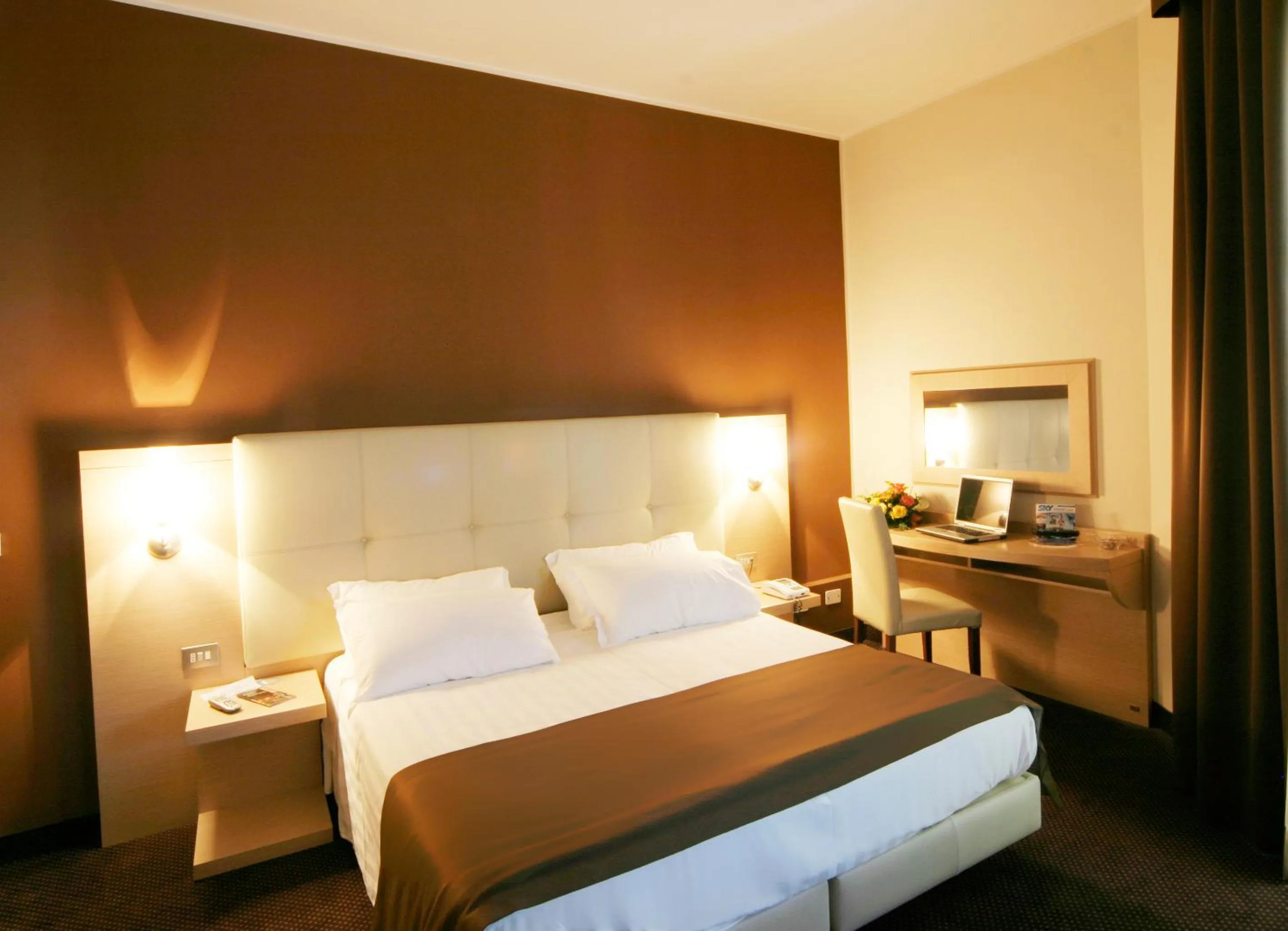 Bed in Hotel Vittoria