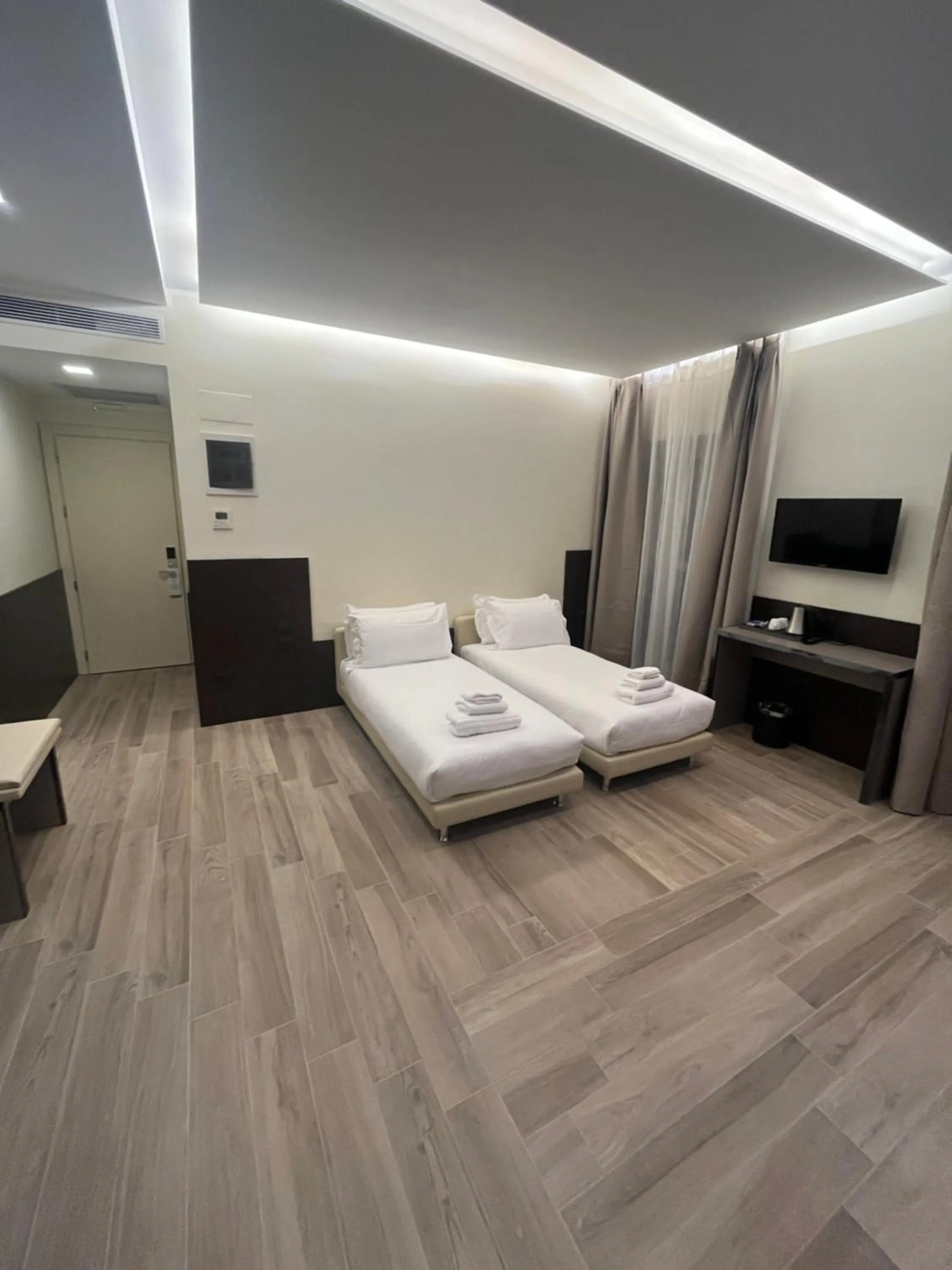 Photo of the whole room, Bed in JR Hotels Bocconi Milano