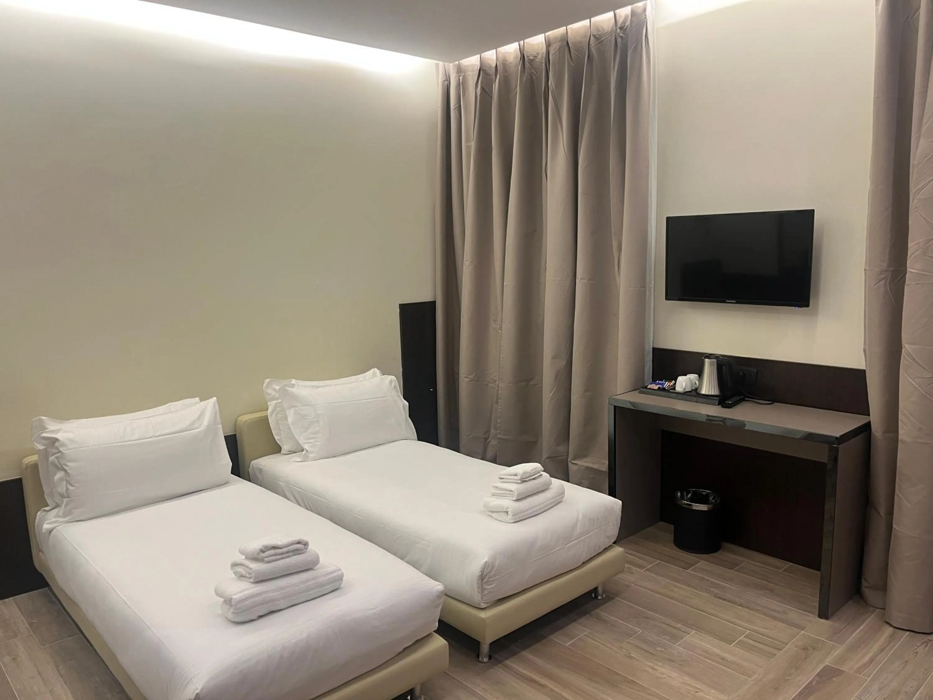 Photo of the whole room, Bed in JR Hotels Bocconi Milano