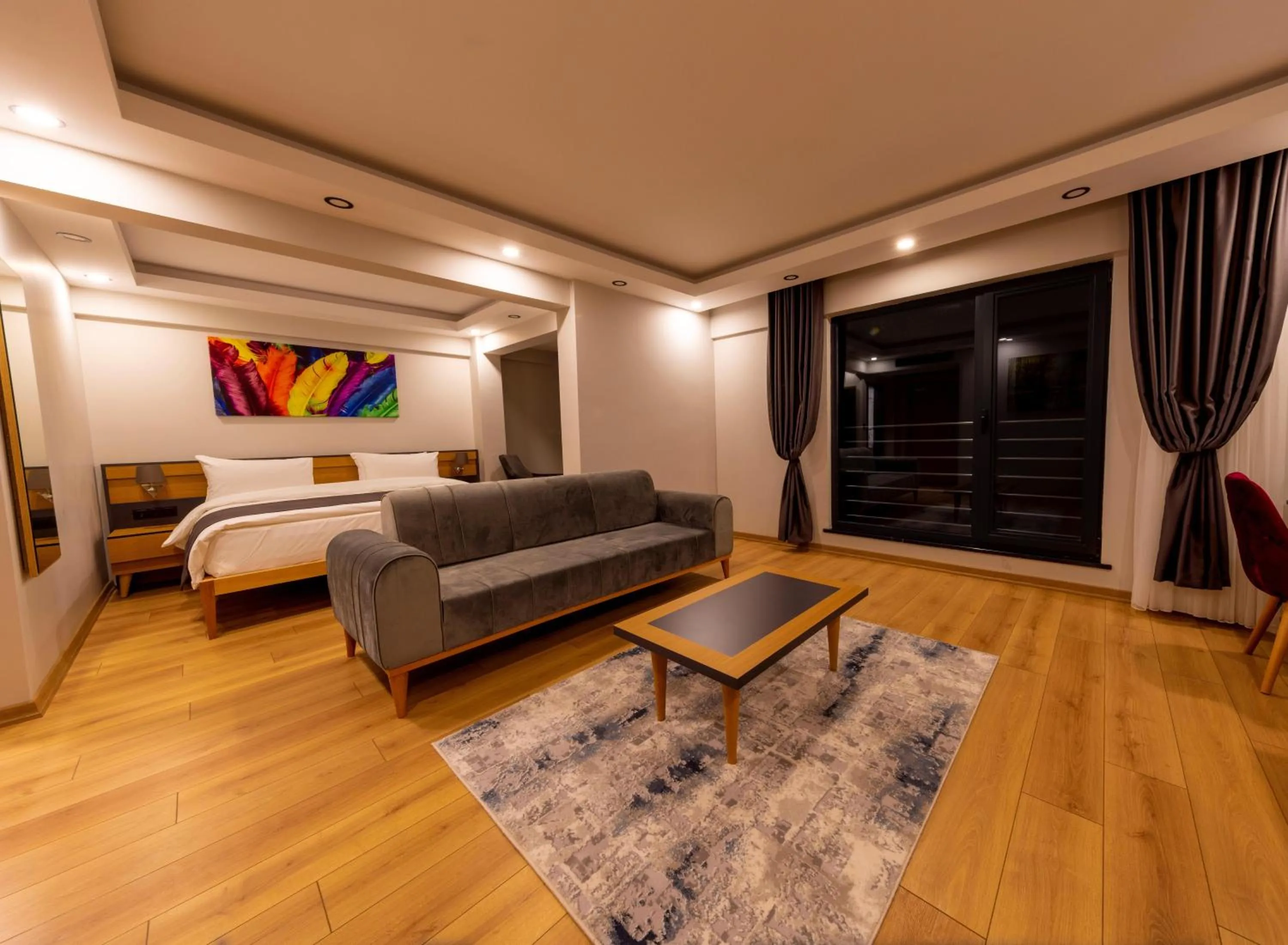 Communal lounge/ TV room, Bed in Şehrar Suite Hotel