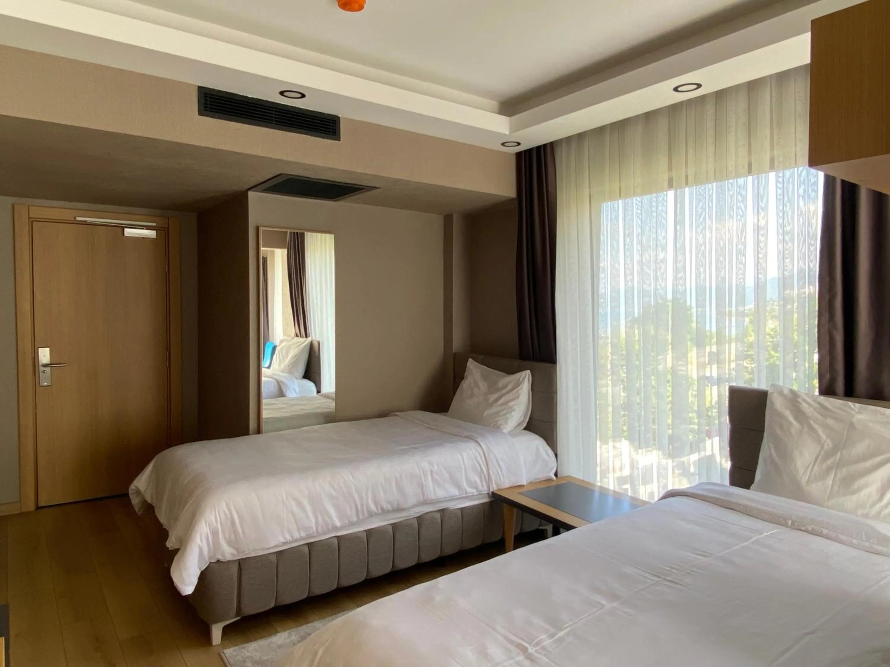 Bed in Şehrar Suite Hotel