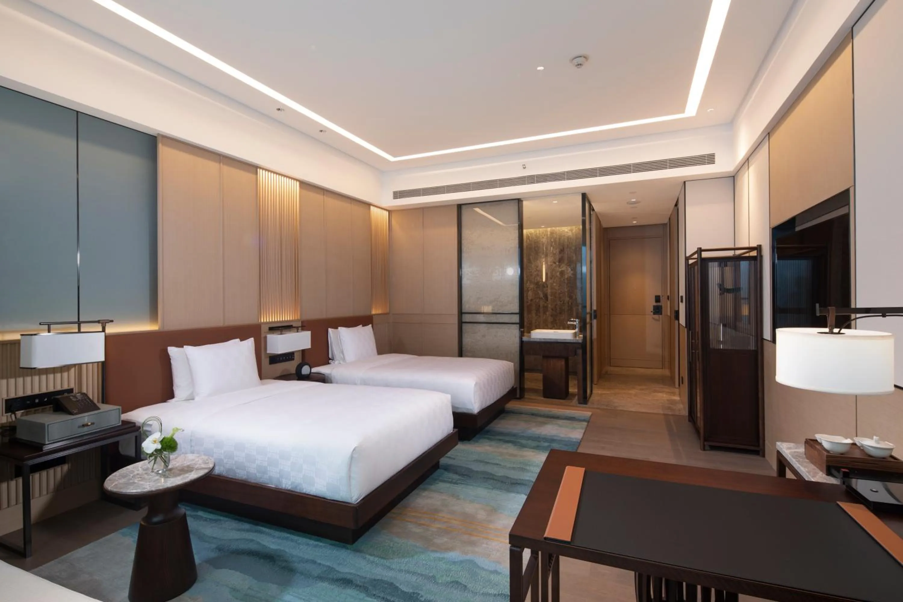 Bed in HUALUXE Yibin