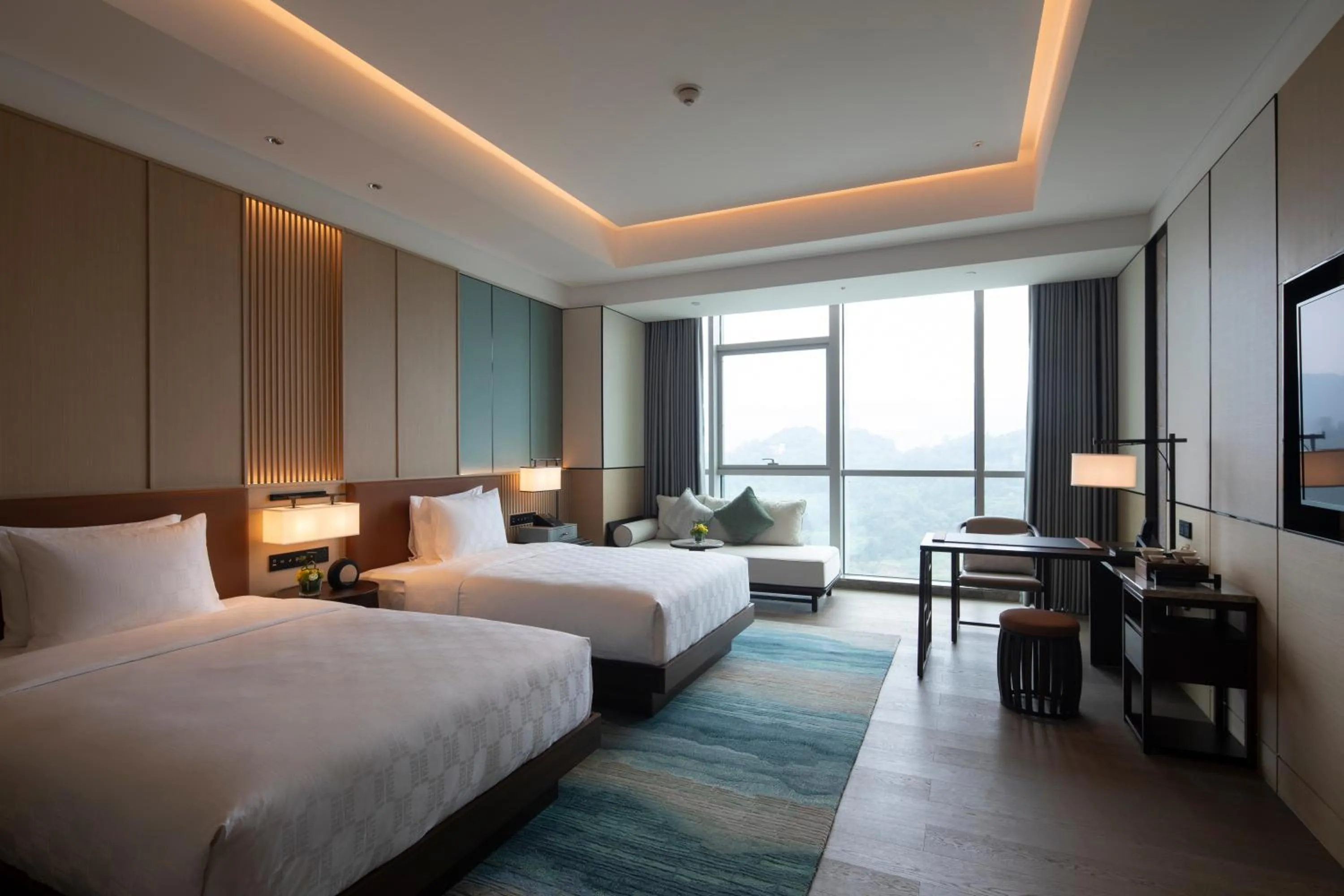 Bed in HUALUXE Yibin