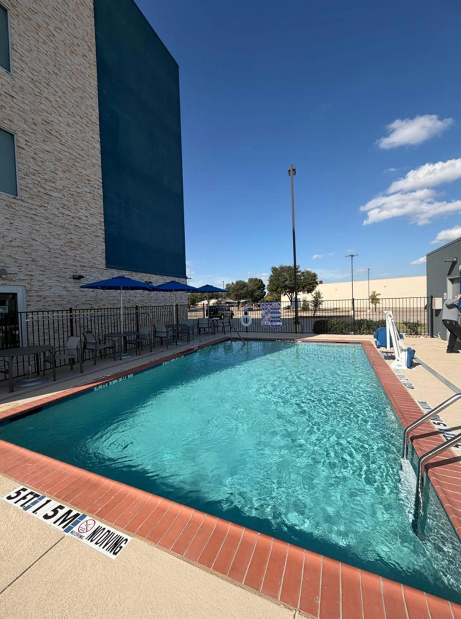 Swimming pool in HOLIDAY INN EXPRESS & SUITES DALLAS PLANO NORTH by IHG