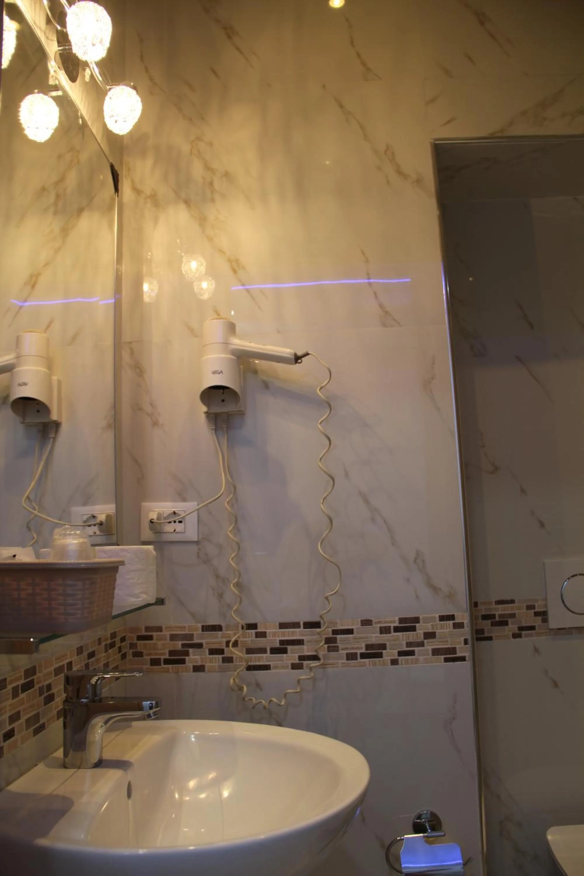 Bathroom in Hotel Orchidea