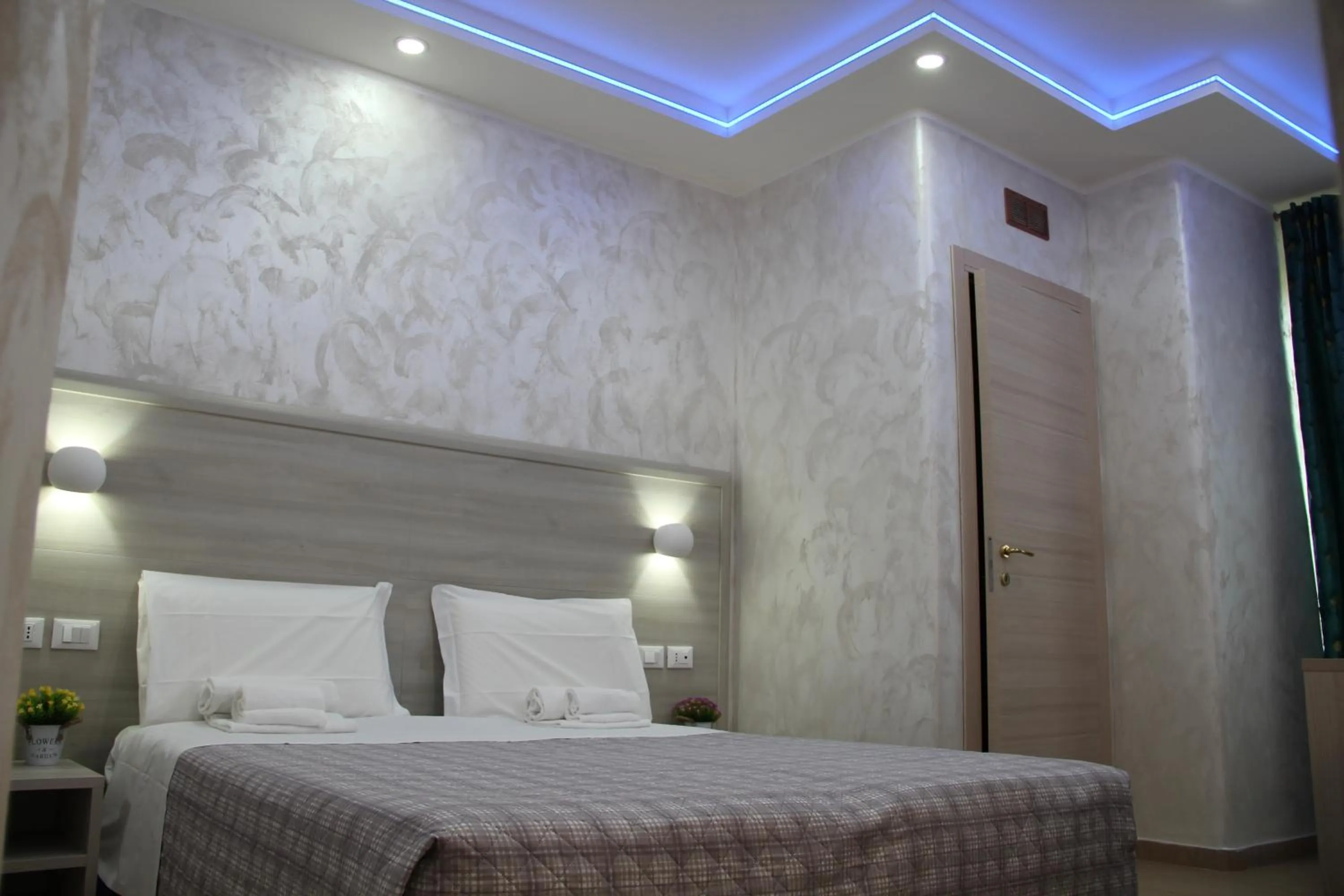 Bed in Hotel Orchidea