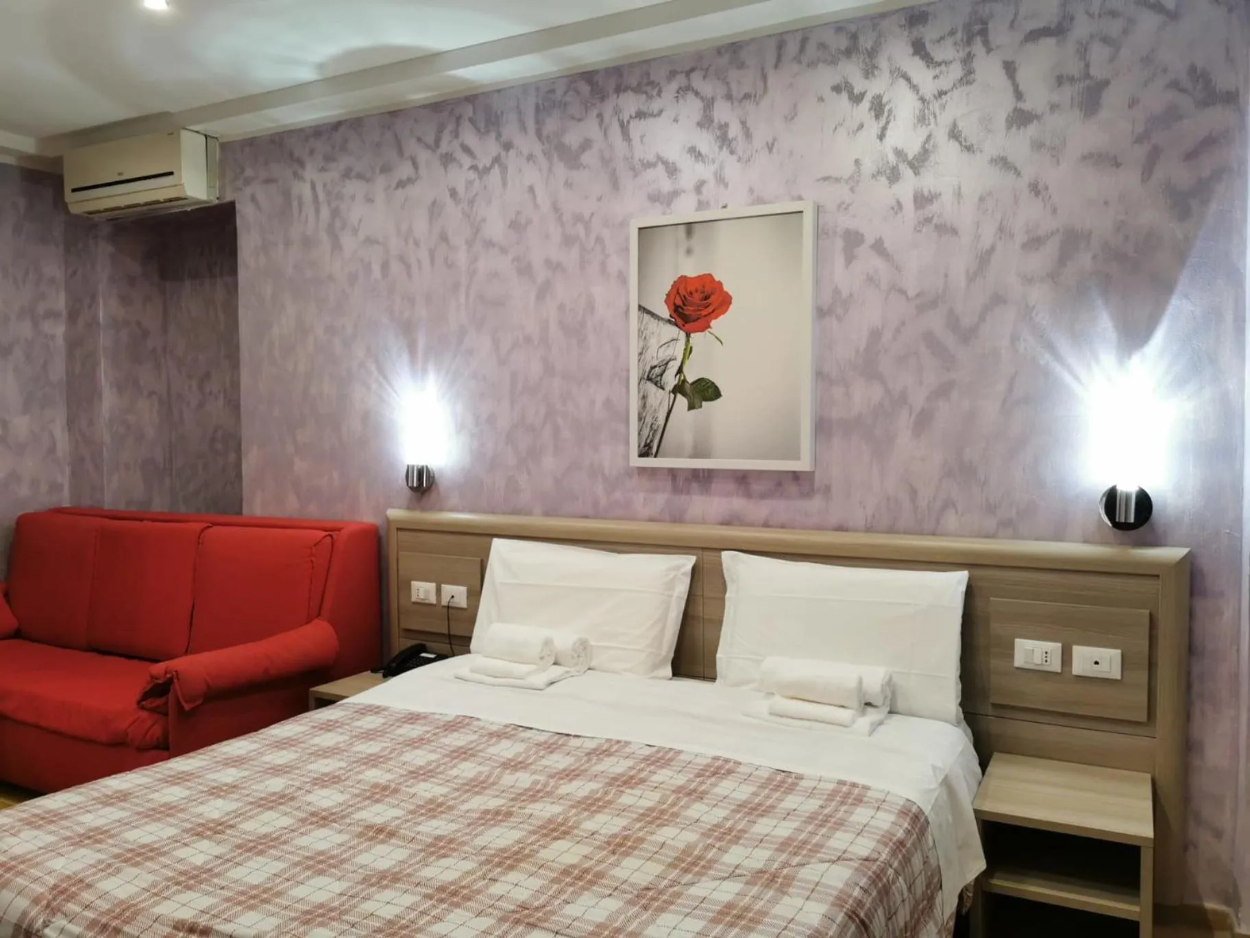 Bed in Hotel Orchidea