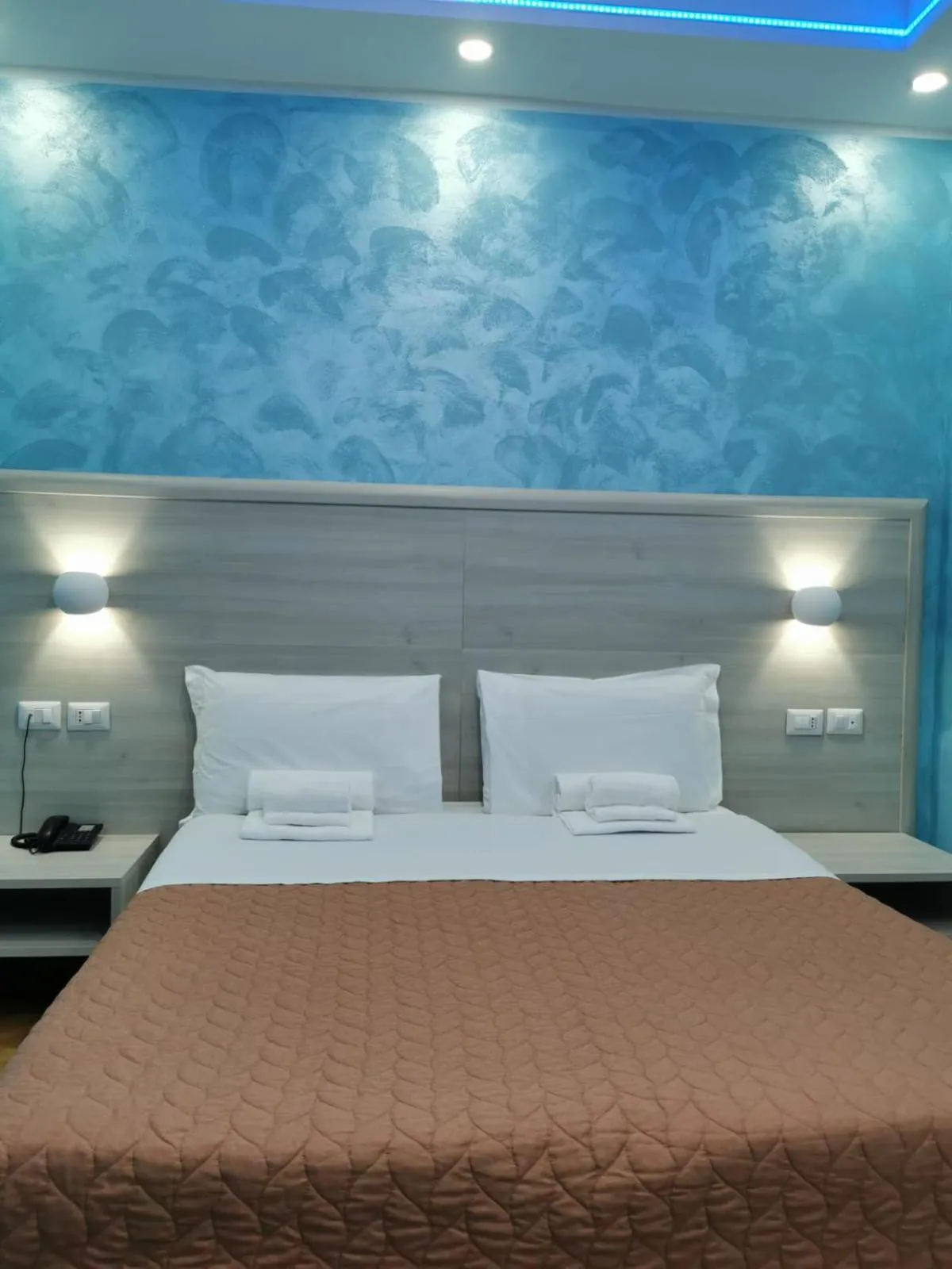 Bed in Hotel Orchidea