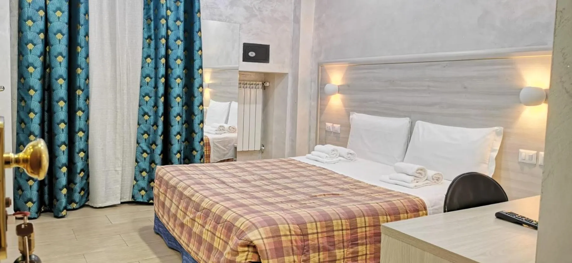 Bed in Hotel Orchidea