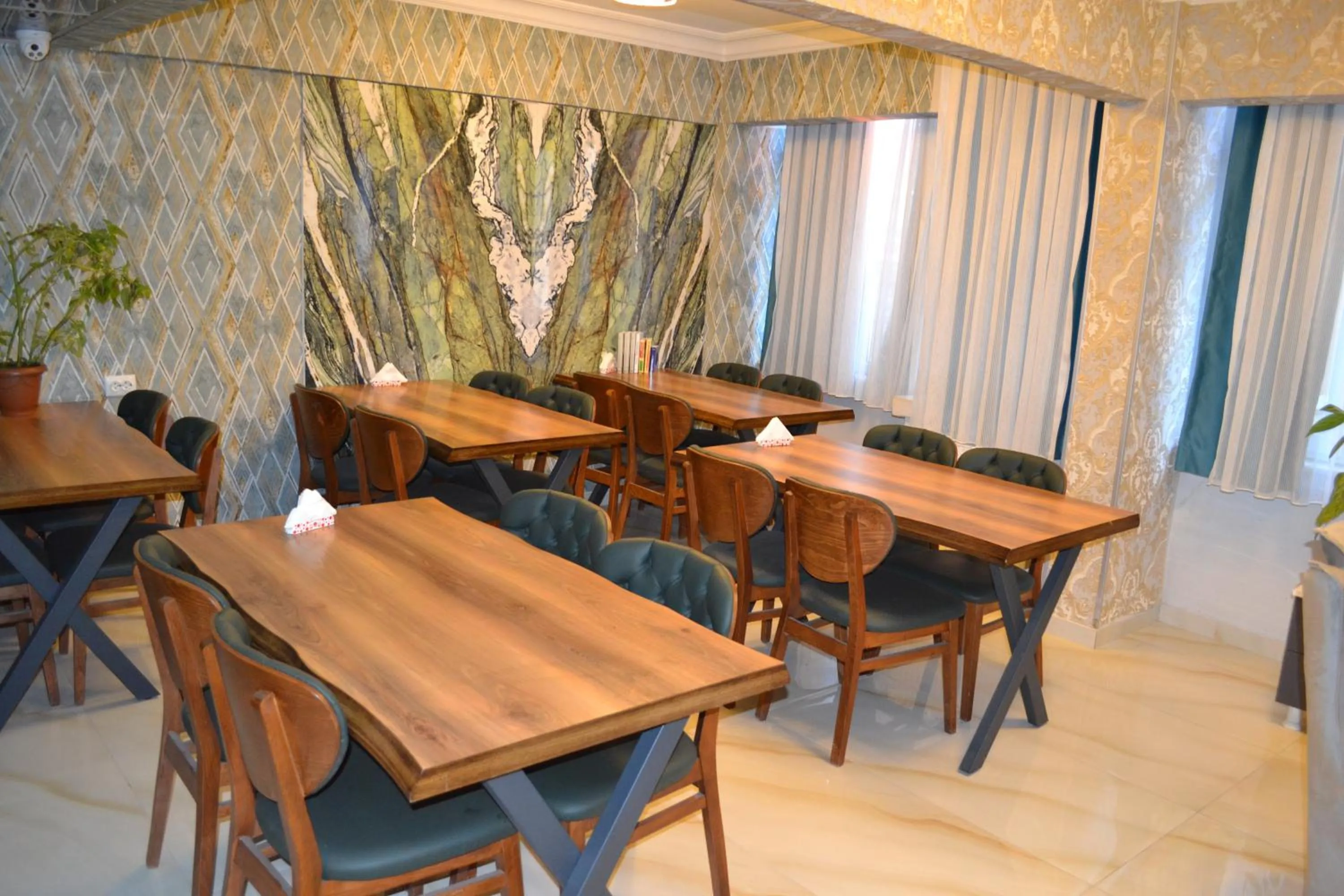 Dining area in Bona Sera Hotel