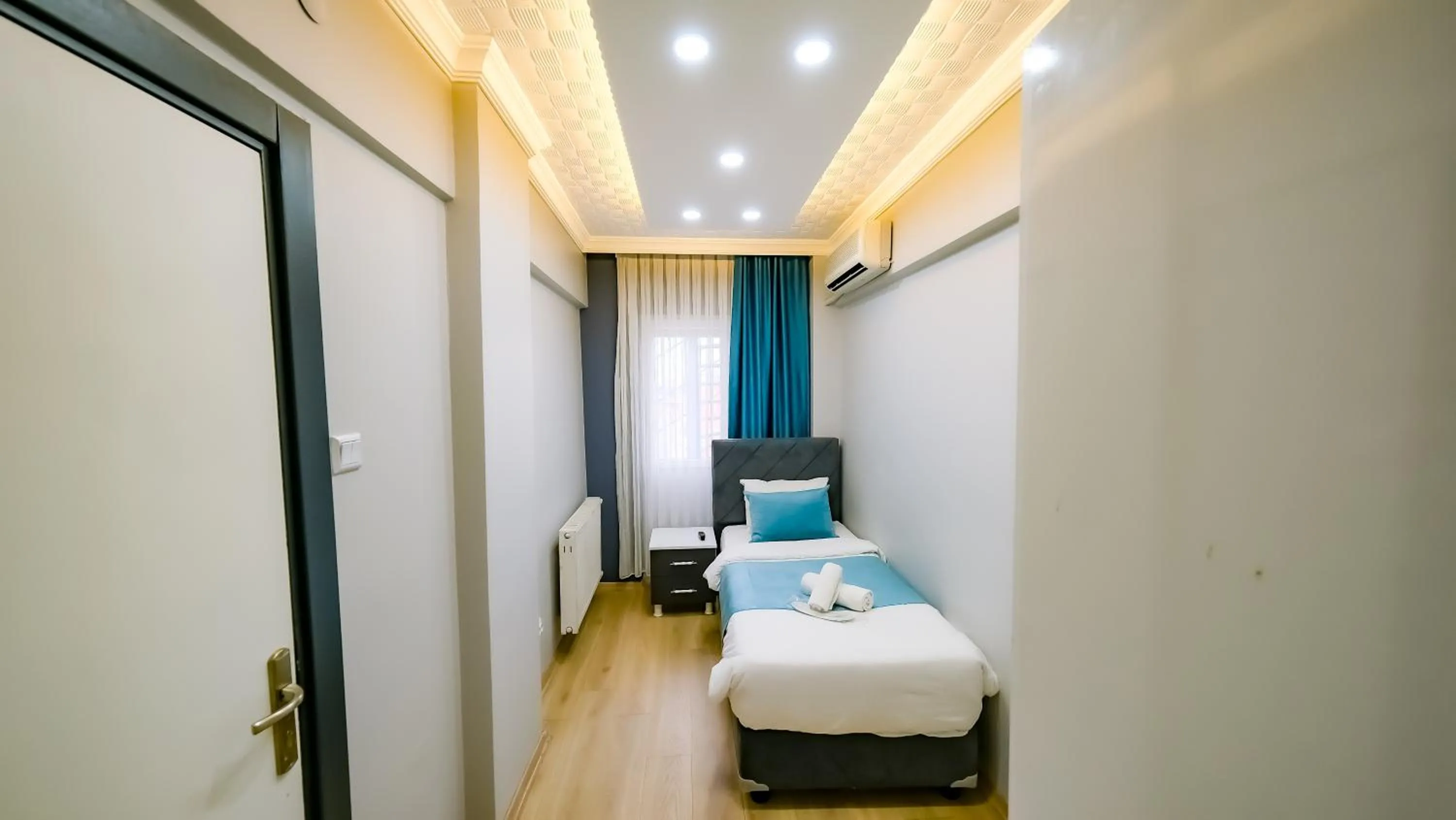 Bed in Bona Sera Hotel